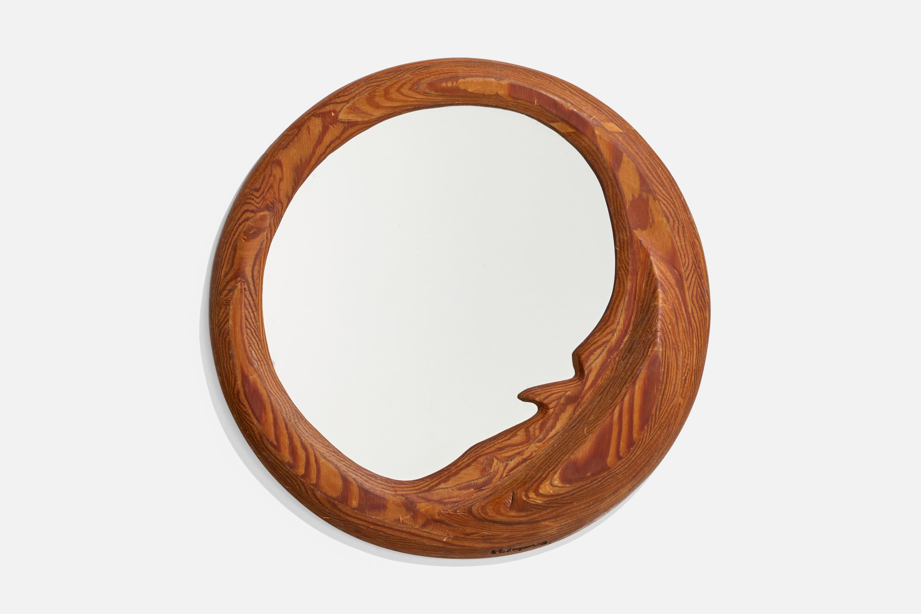 A mirror glass framed in pine wood, designed and produced by an American Designer, United States, 1980s. Signed and marked.
 