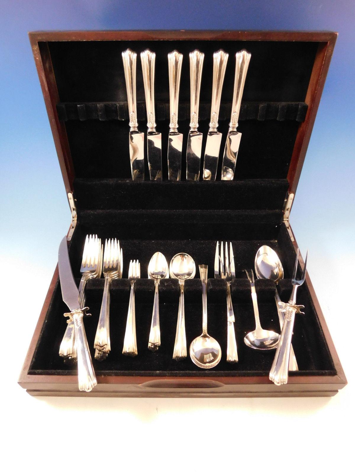 Dinner size American Directoire by Lunt, circa 1931, sterling silver flatware set, 43 pieces. Great starter set! This set includes:

6 dinner size knives, 9 5/8