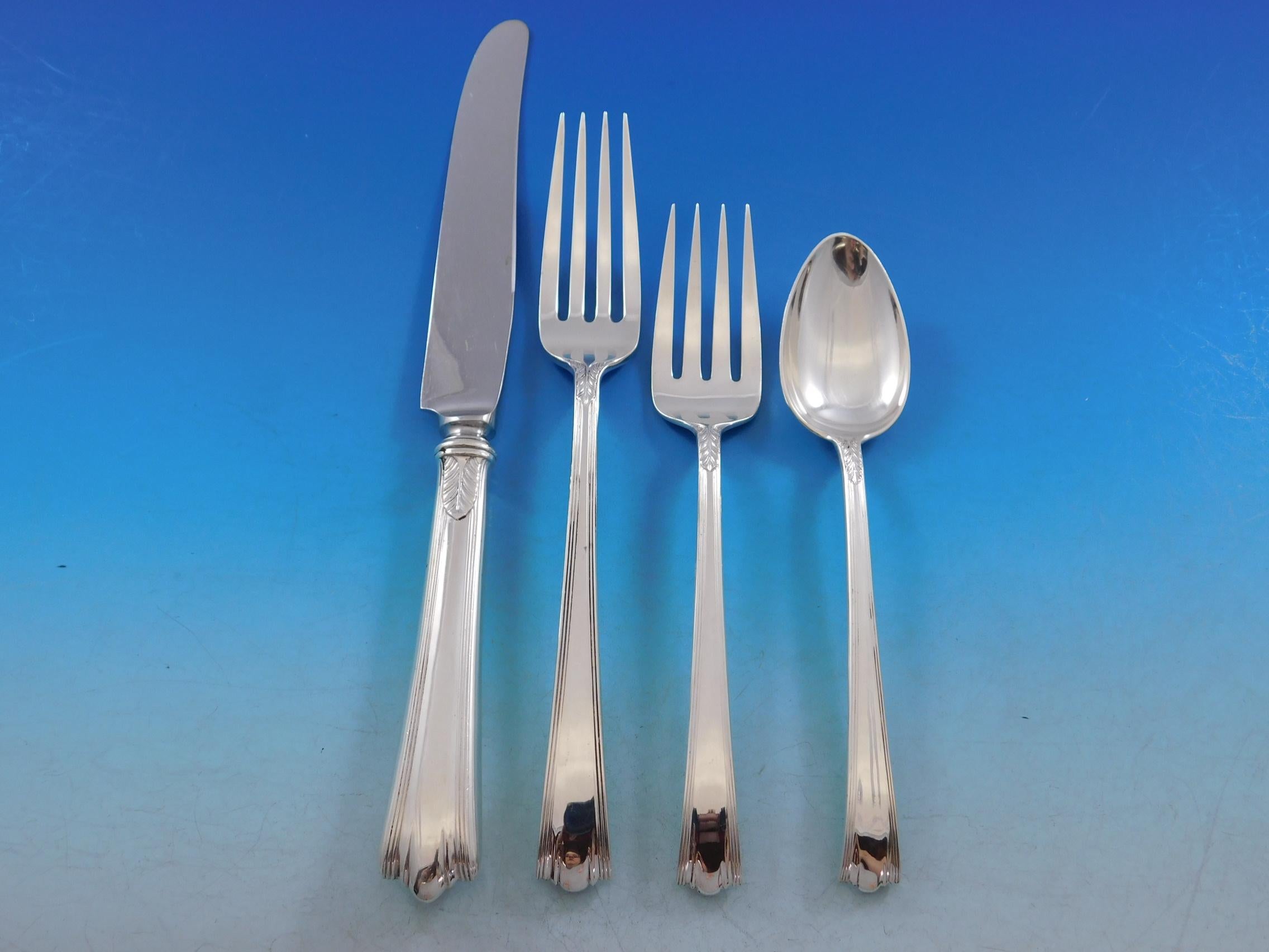 American Directoire By Lunt sterling silver Flatware set, introduced in the year 1931, designed by Frederick W. Koonz - 94 Pieces. This set includes:

12 knives, 9