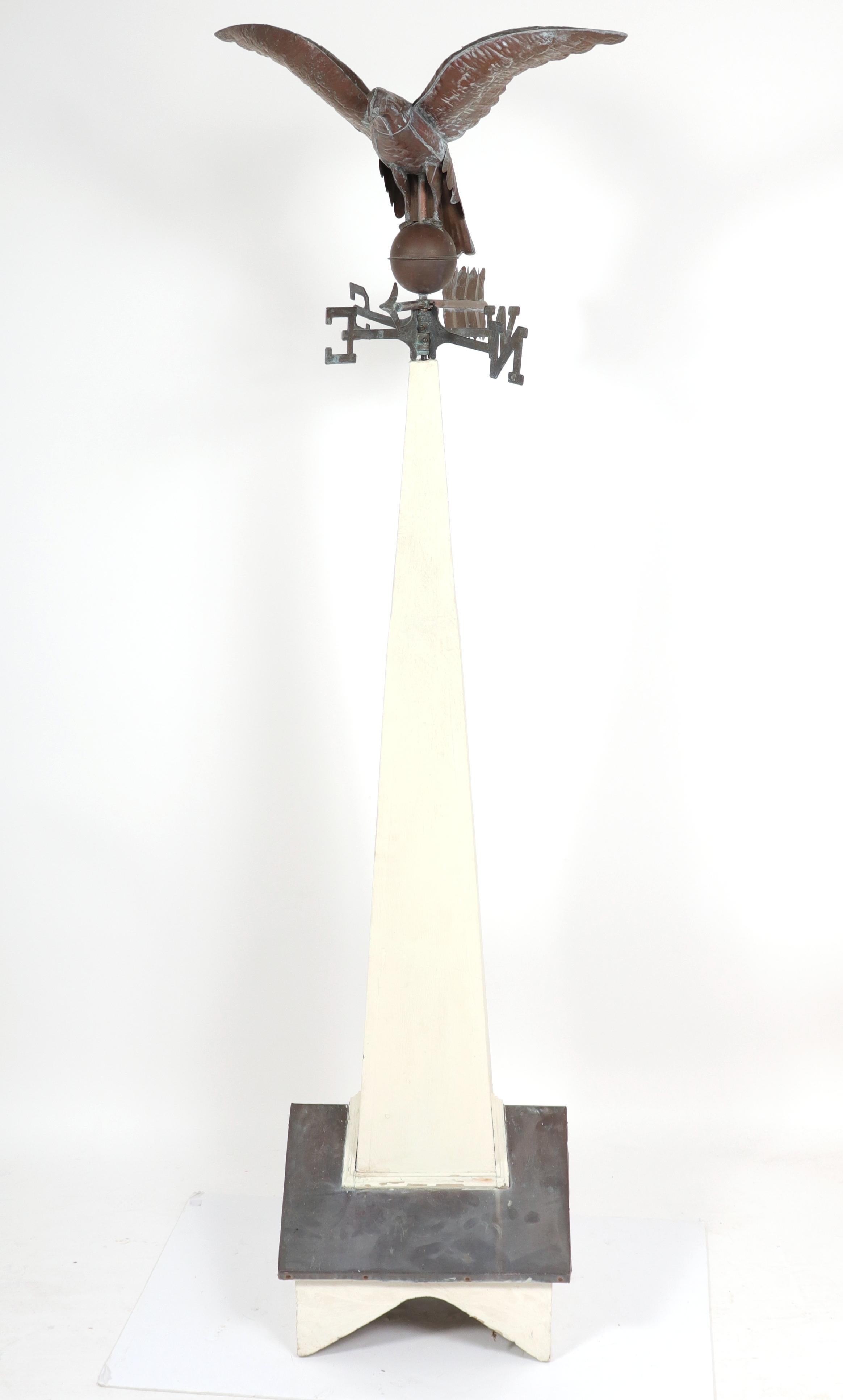 Vintage American eagle weather-vane mounted on wood spire.
Measures: Weather-vane 18