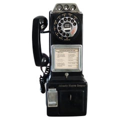 American Electric Company 1940 Münze Wandtelefon schwarz aus massivem Stahl