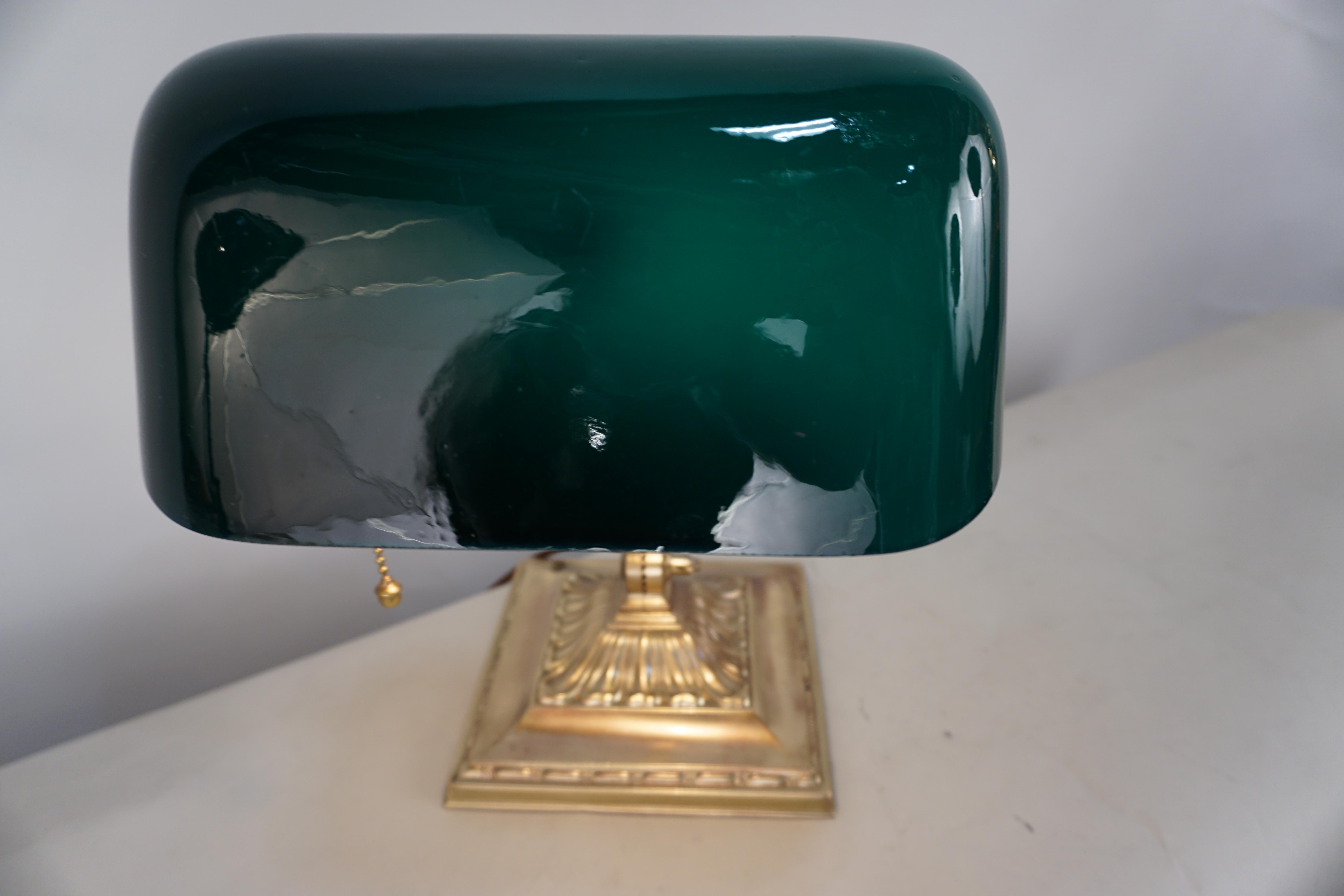 American adjustable brass and green glass desk lamp.
Base measurements: 6.7/8