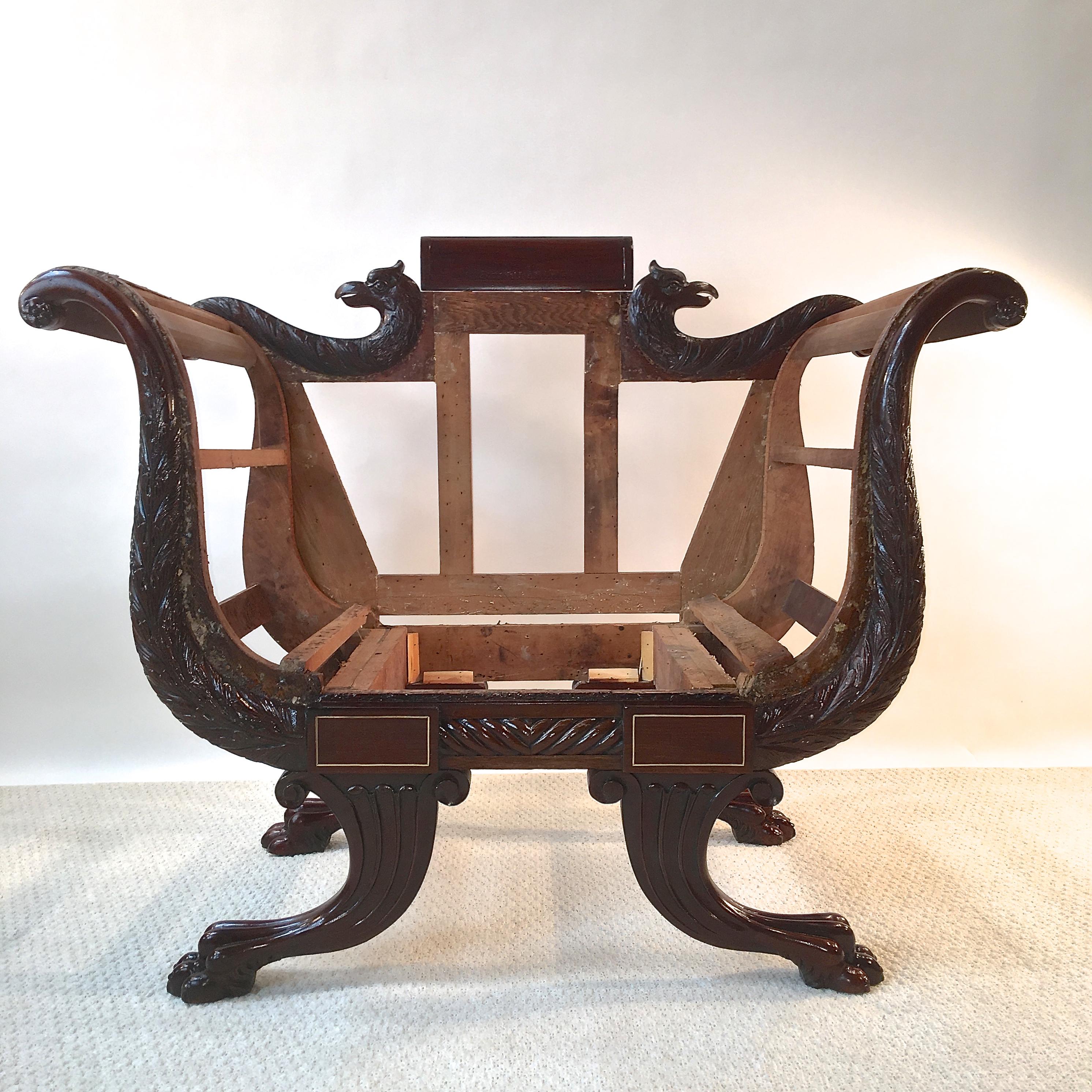 Mid-late 19th century (Second Period) American Empire chair, stripped, tightened and finish restored and polished, ready for your upholsterer's workbench.
It is most unusual to find seating of this period and style in this size. Sofas and settees