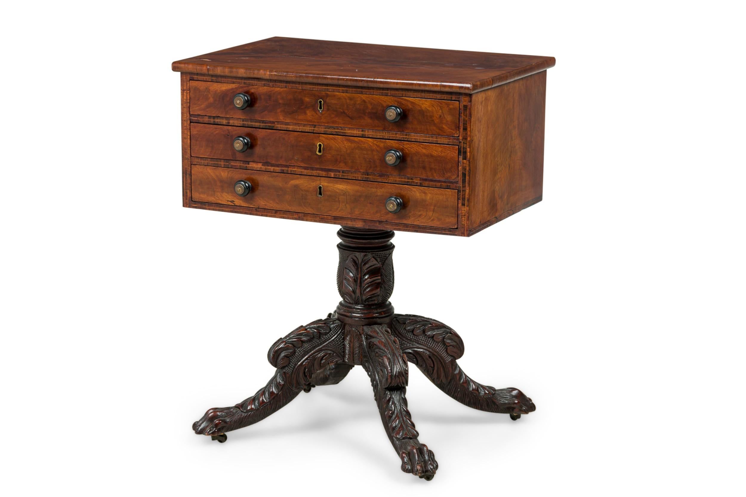 American Empire mahogany side table with three draws supported on a pedestal base and standing on 4 carved legs (ATTRIBUTED TO: DUNCAN PHYFE)
