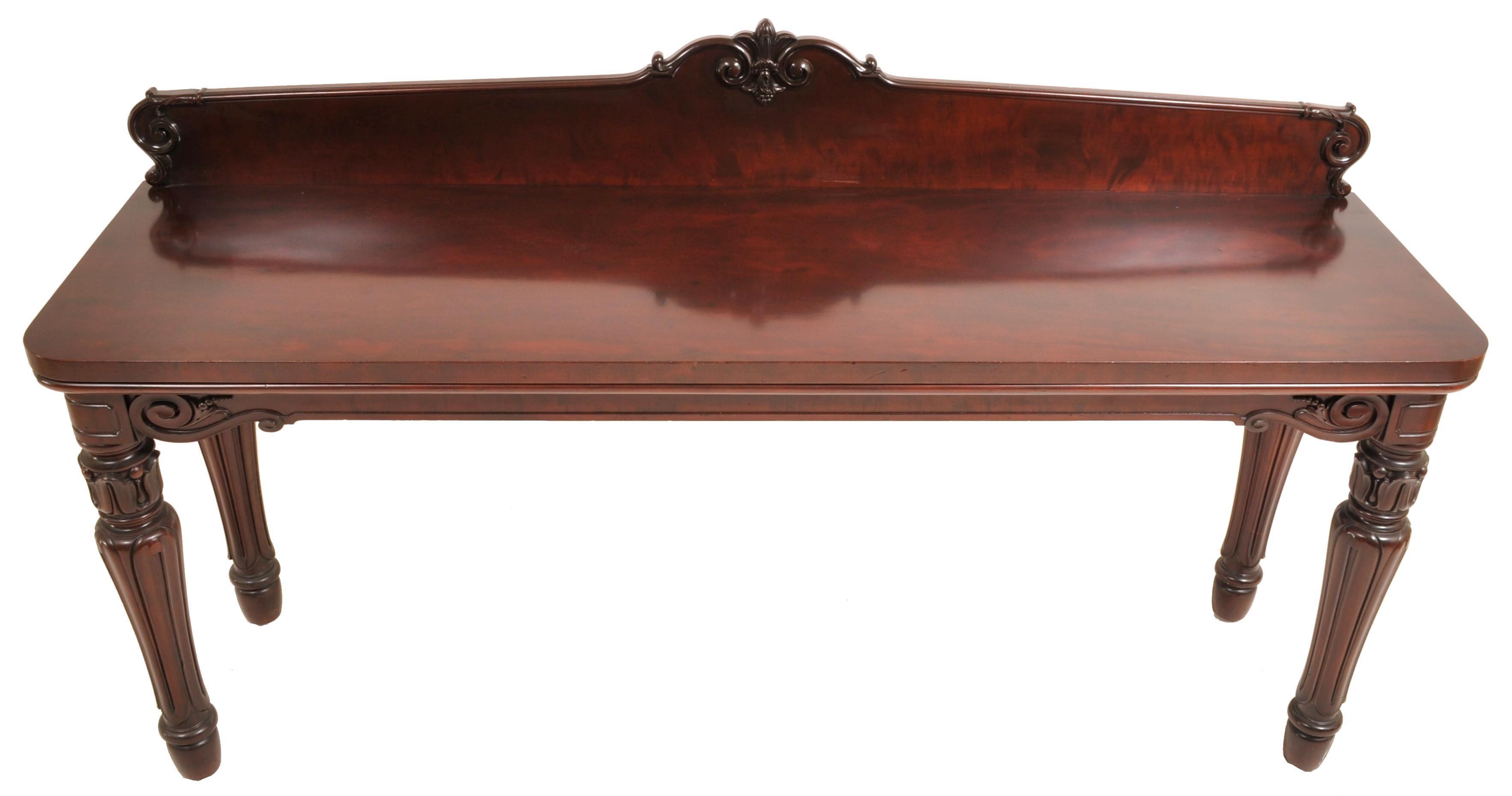 Rare and unusual antique American Empire mahogany sideboard or server from J.D. Rockefeller's Residence, NY, circa 1835. The server having a carved gallery to the back, the base having corresponding carving to the skirt. The server standing on four