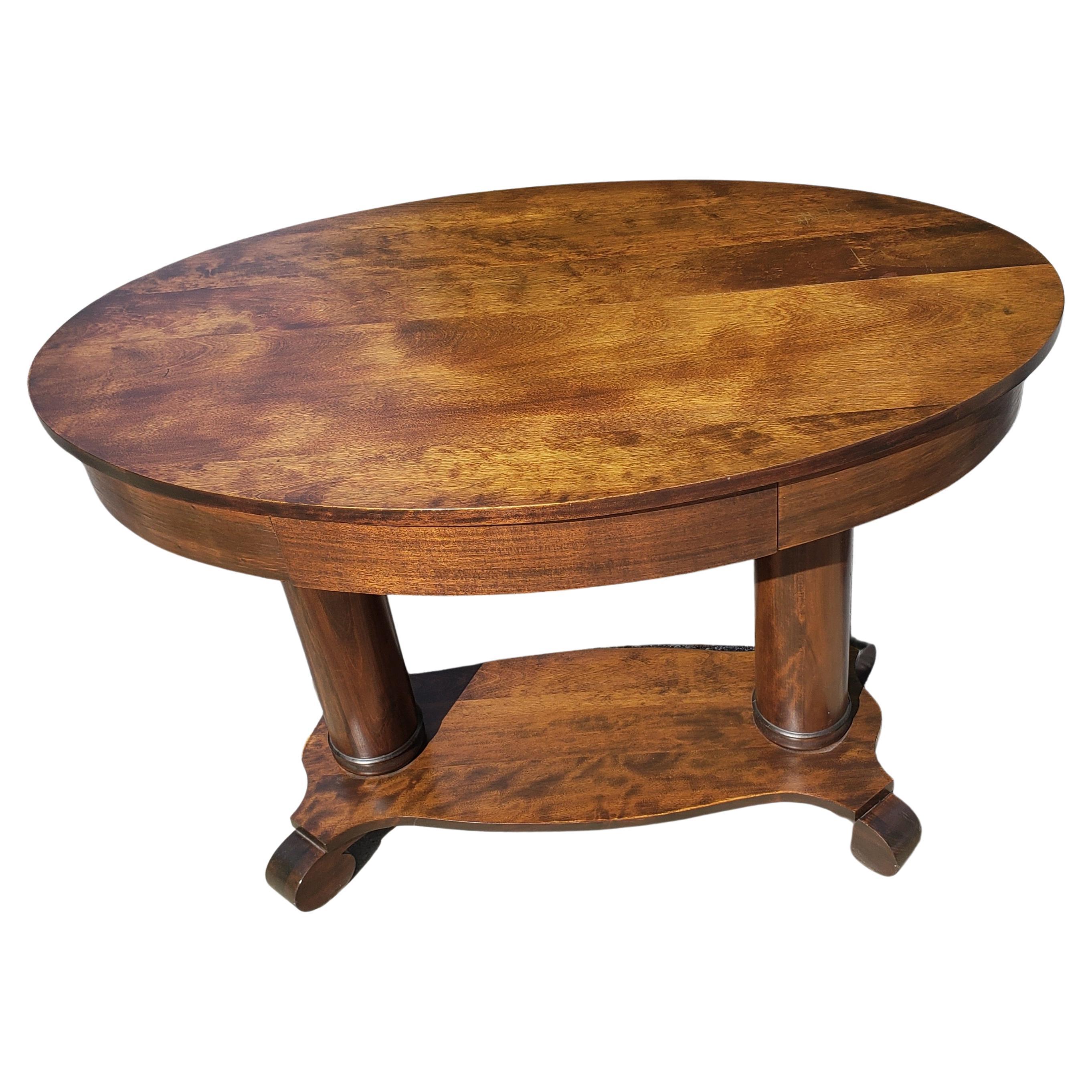 Absolutely gorgeous American Empire style oval library table with drawer in 
Stained Oak. Measures 42