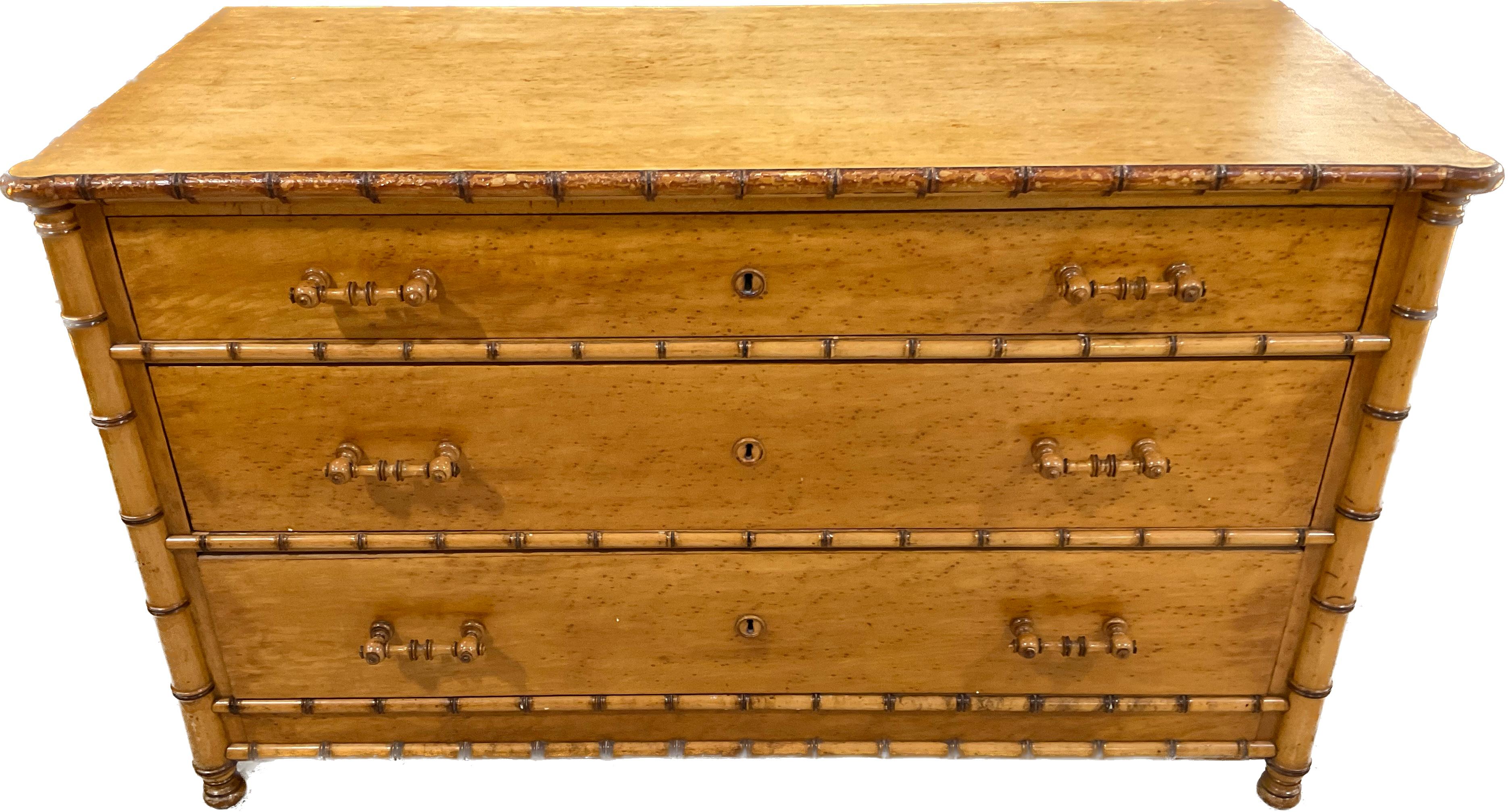 American faux bamboo Birdseye maple chest attributed to R.J. Horner. Three drawer chest with original faux bamboo handles, birds eye maple wood.