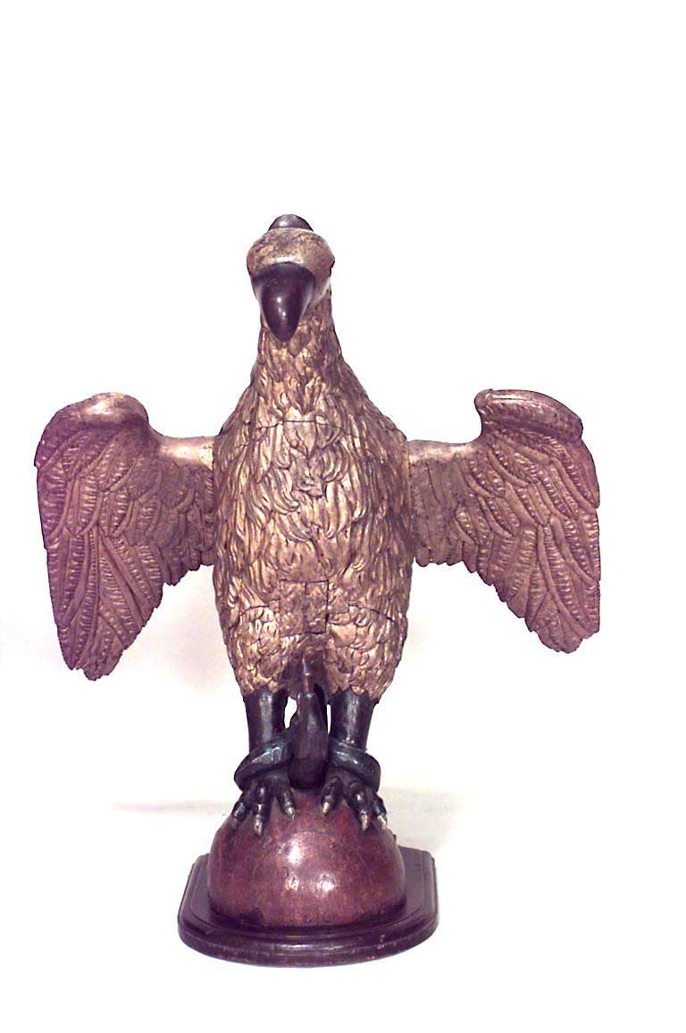 American Federal (19th Cent) life size gilt carved eagle figure standing on serpent and round painted base
