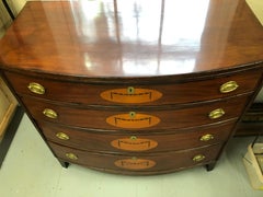 American Federal Bow Front Chest with Adams Inlays and Ovals on Drawers