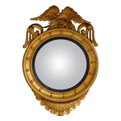 Espejo convexo federal americano de madera dorada con águila posada huyendo, circa 1820