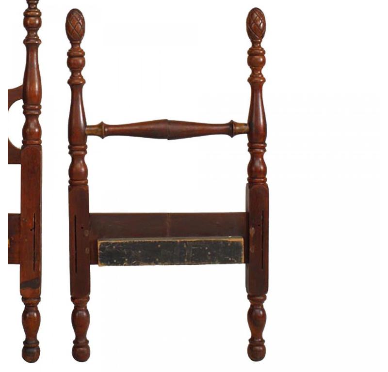 American Federal-style (19th Century) small mahogany child's four poster bed with pineapple finials (includes: headboard, footboard, does not include rails.) (Irregular size, check measurements).

Condition: Good; Wear consistent with age and use