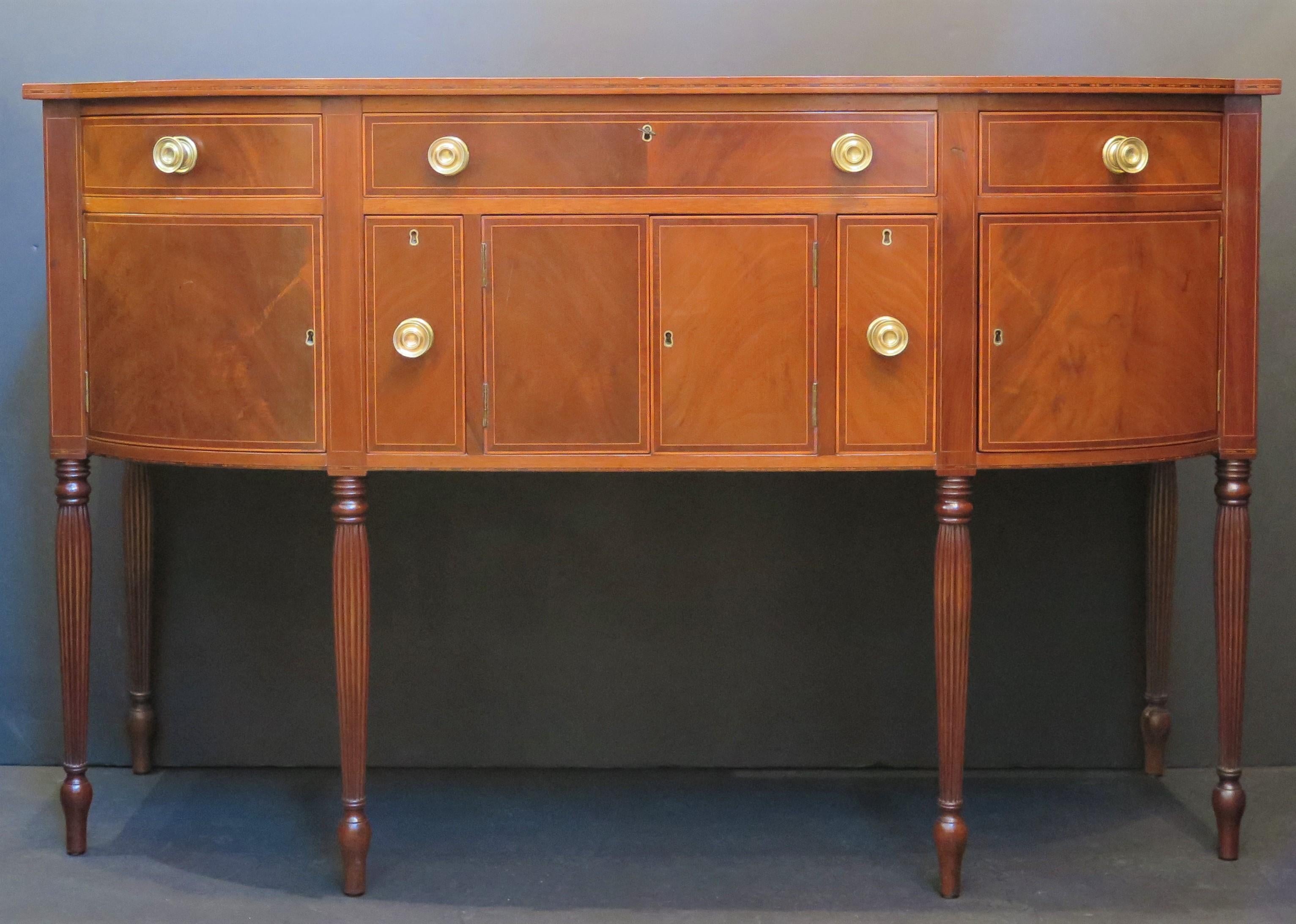 An American Federal mahogany sideboard with an elongated 