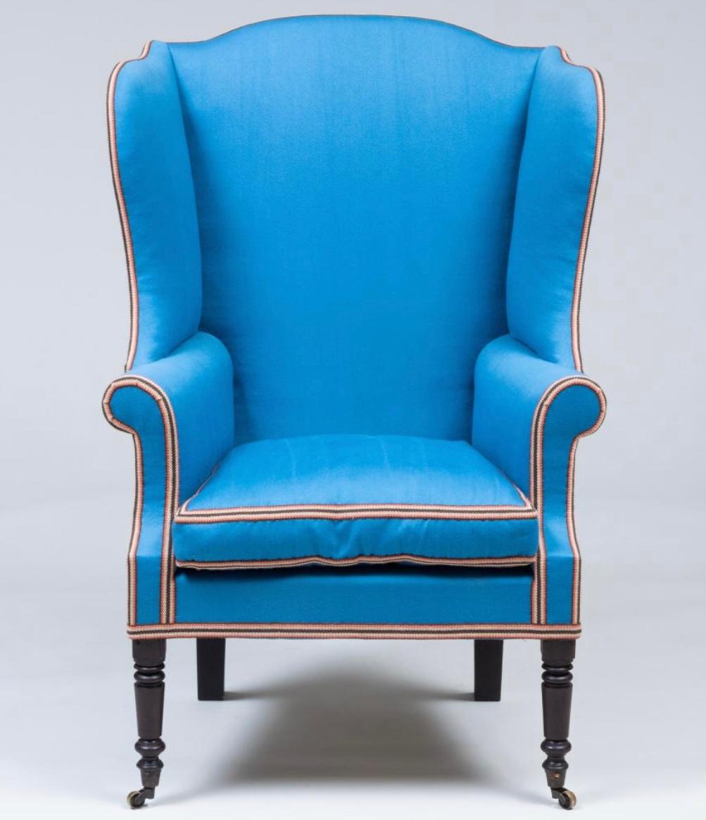 Federal period mahogany American wingback armchair in blue upholstery. In very good condition and nicely re-upholstered. Structurally sound and comfortable.