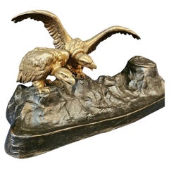 Calamaio americano in bronzo con figure (avvoltoi)