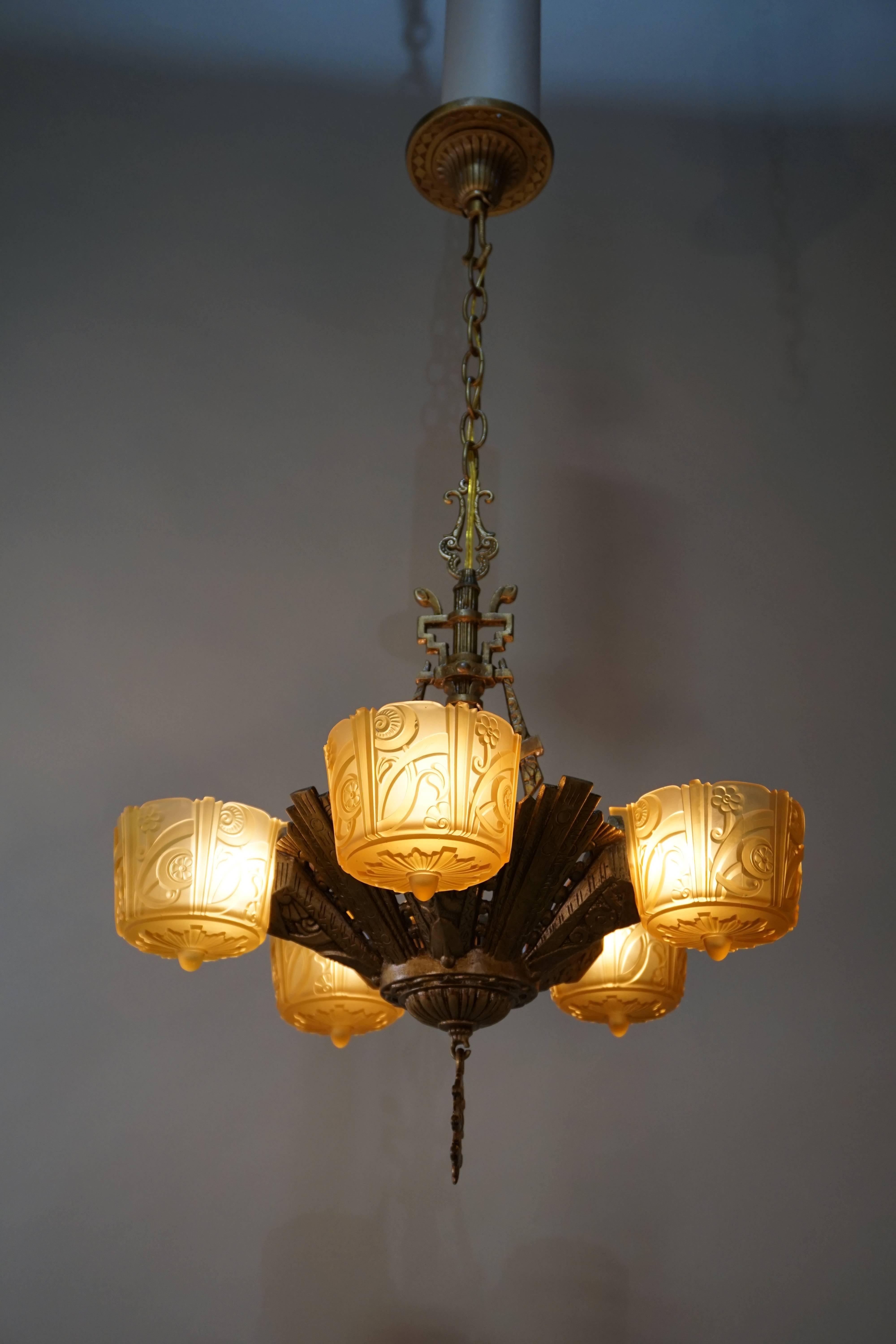 Metal American Five-Light Amber Glass Chandelier by Riddle Lighting Co. 