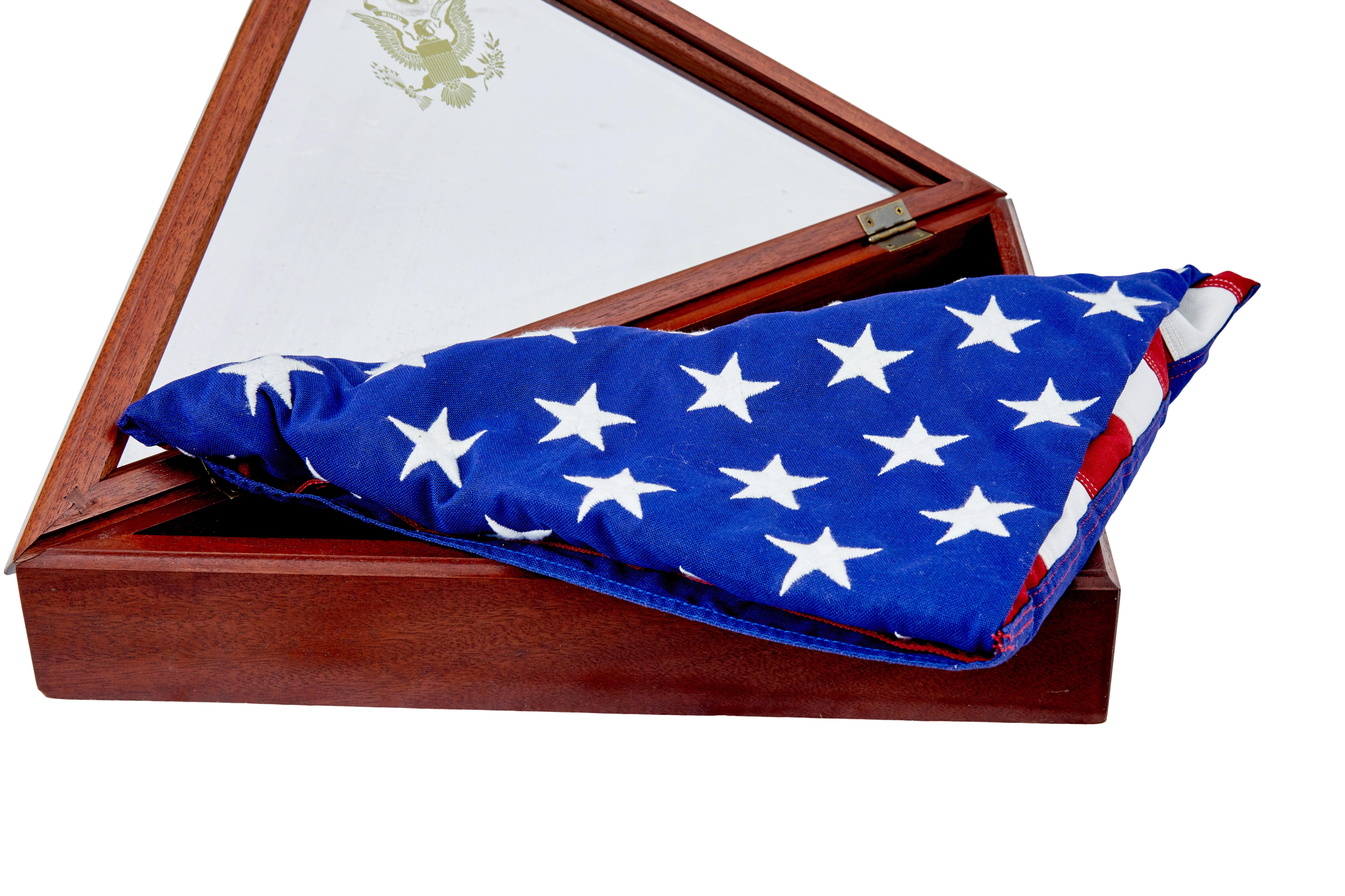 Fabric American flag in glazed presentation cabinet For Sale