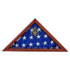 Used American flag in mahogany presentation cabinet