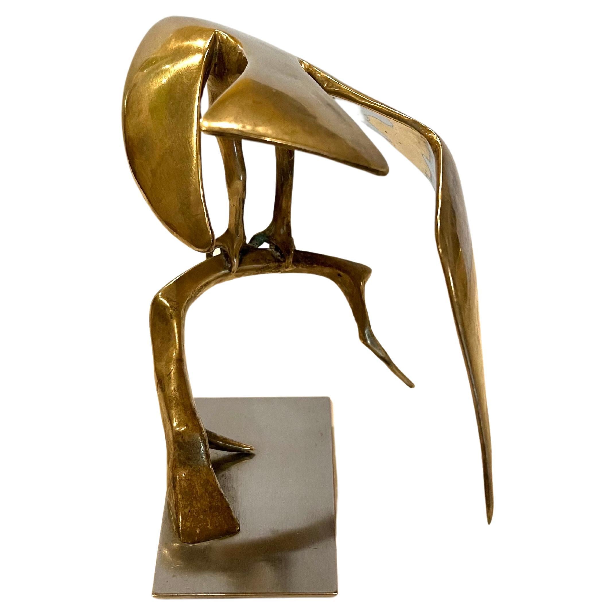 Beautiful American Eagle in solid bronze, resting on a branch sitting on a solid stainless steel base gorgeous piece, unsigned with great quality.