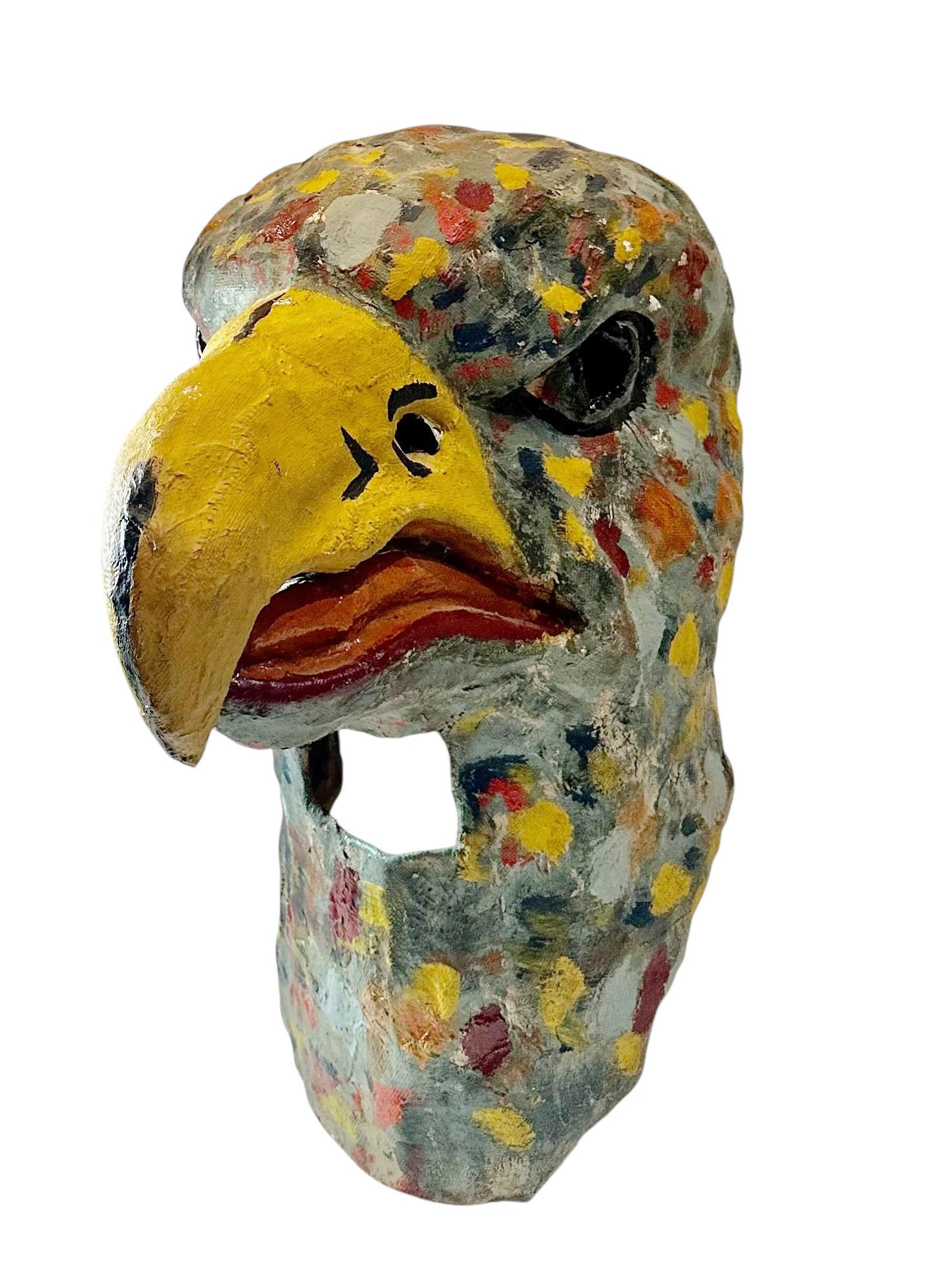 An exceptional late 19th century American folk art eagle’s head mask, crafted from papier-mâché and hand painted in vivid detail. Dating to the 1890s, this striking piece reflects the patriotic symbolism and imaginative artistry of American folk