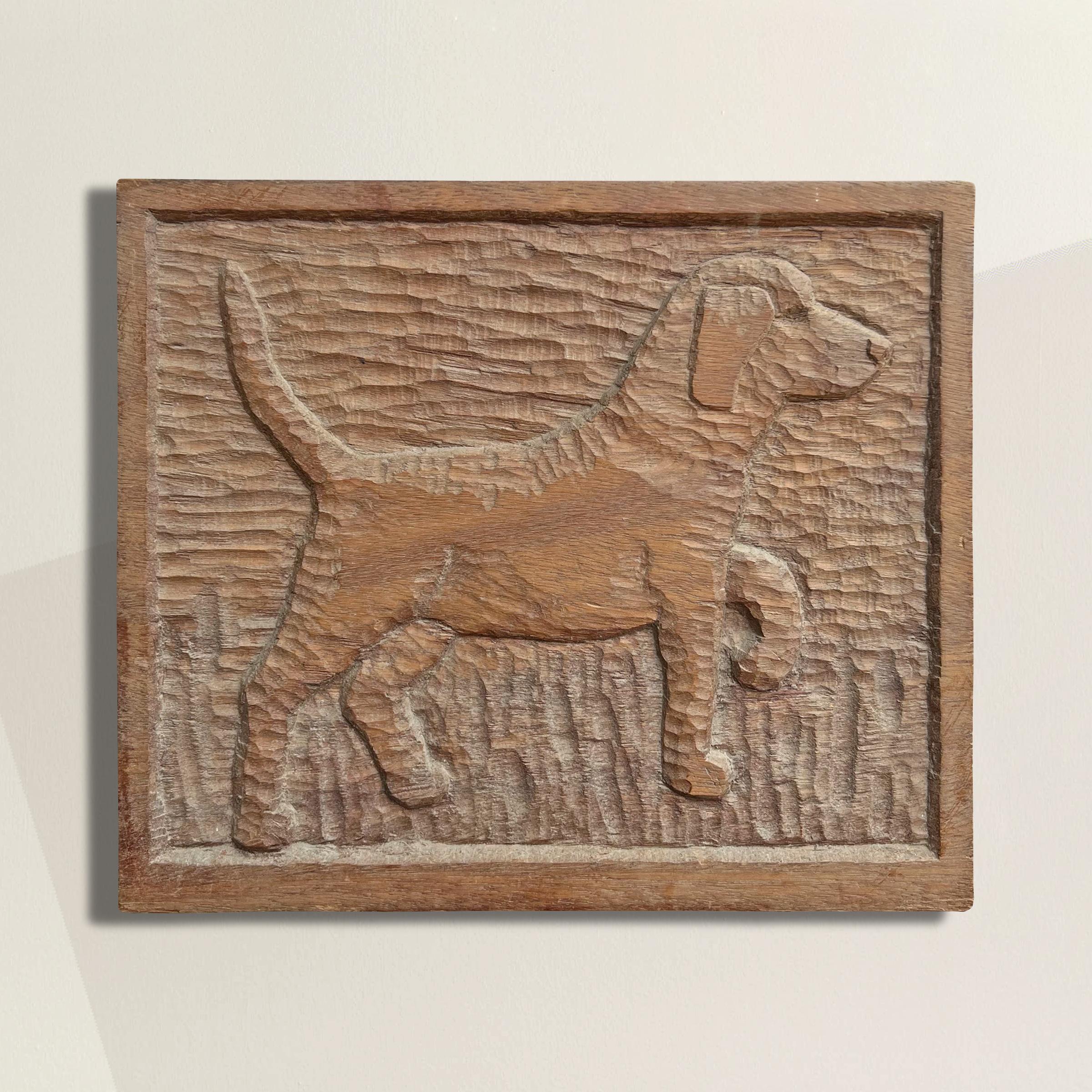 A charming 20th century American Folk Art wood panel carved in low relief depicting a Labrador walking in a field of grasses, and including a wire hanger on the back. The perfect gift for the sportsperson in your life, or for hangin in a kid's