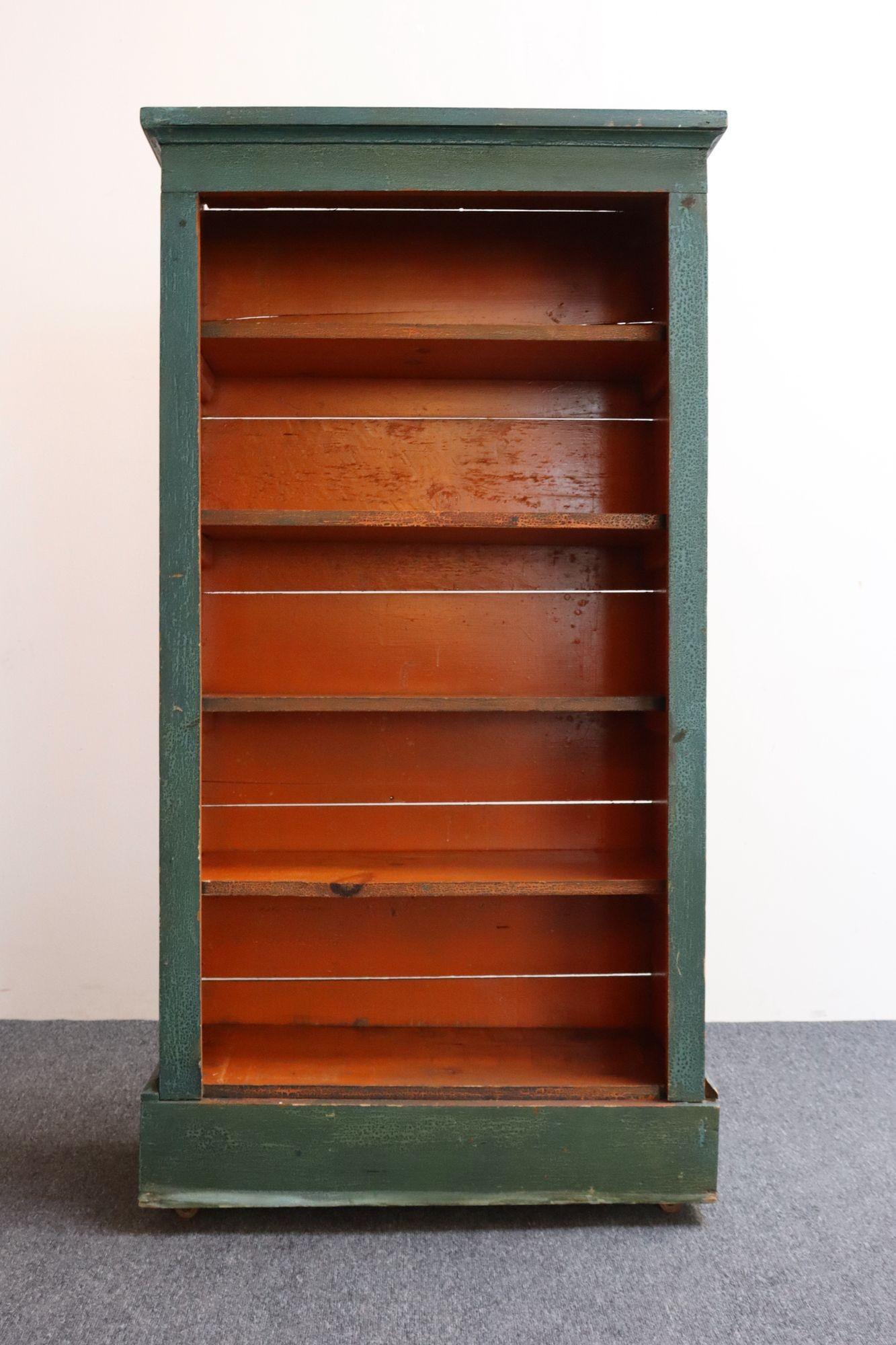 American Folk Art Painted Pine Teal Bookcase on Casters with Removable Shelves In Distressed Condition For Sale In Brooklyn, NY