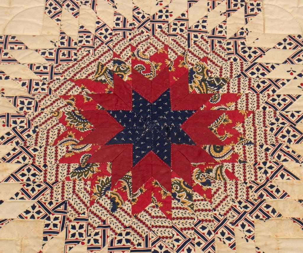 Americana Folk Art star of Bethlehem pieced quilted wall hanging in printed calido and muslin-linen.

Dealer: S138XX
