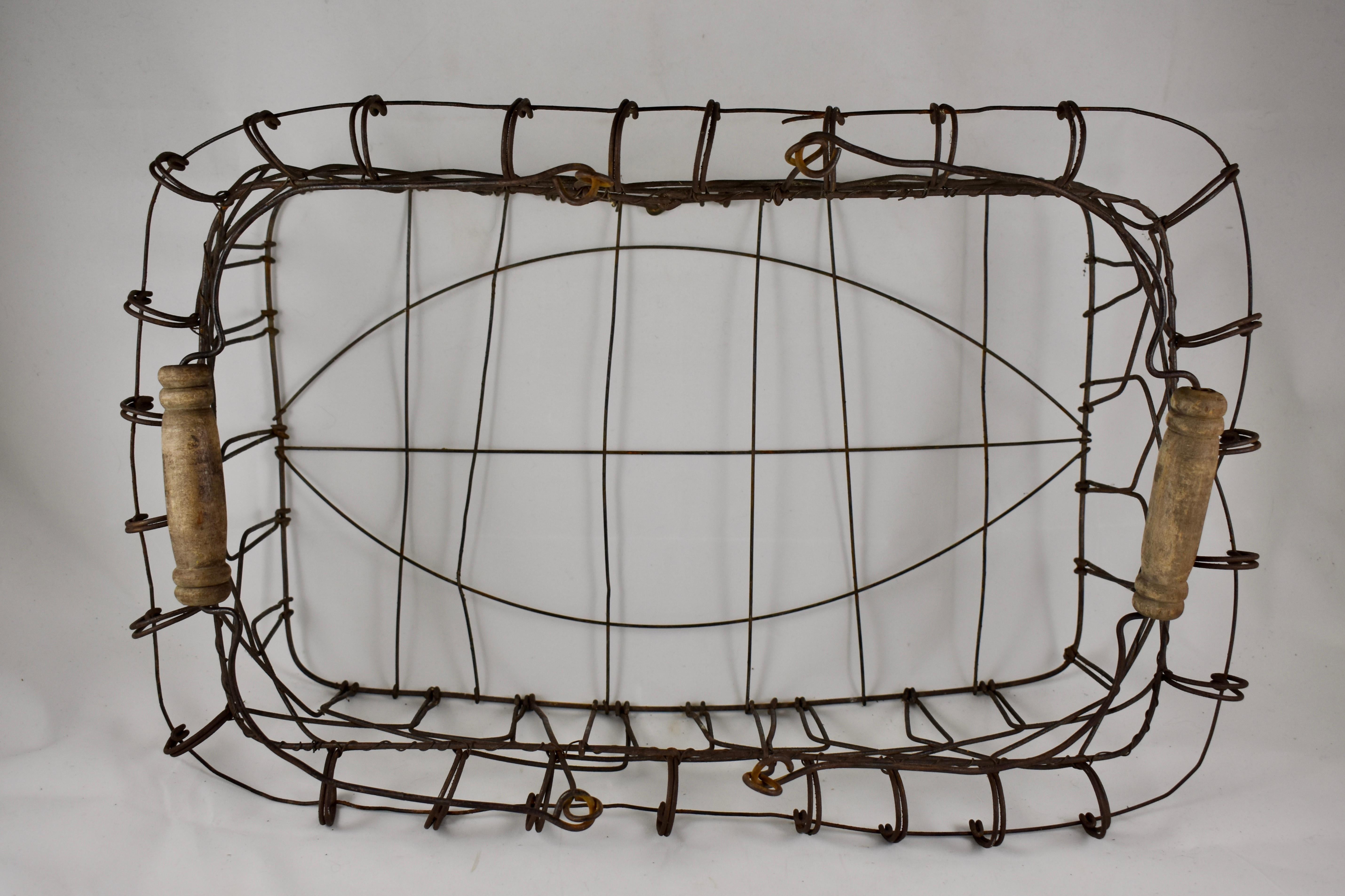 American Folk Art Wire Basket with Wooden Handles In Good Condition In Philadelphia, PA
