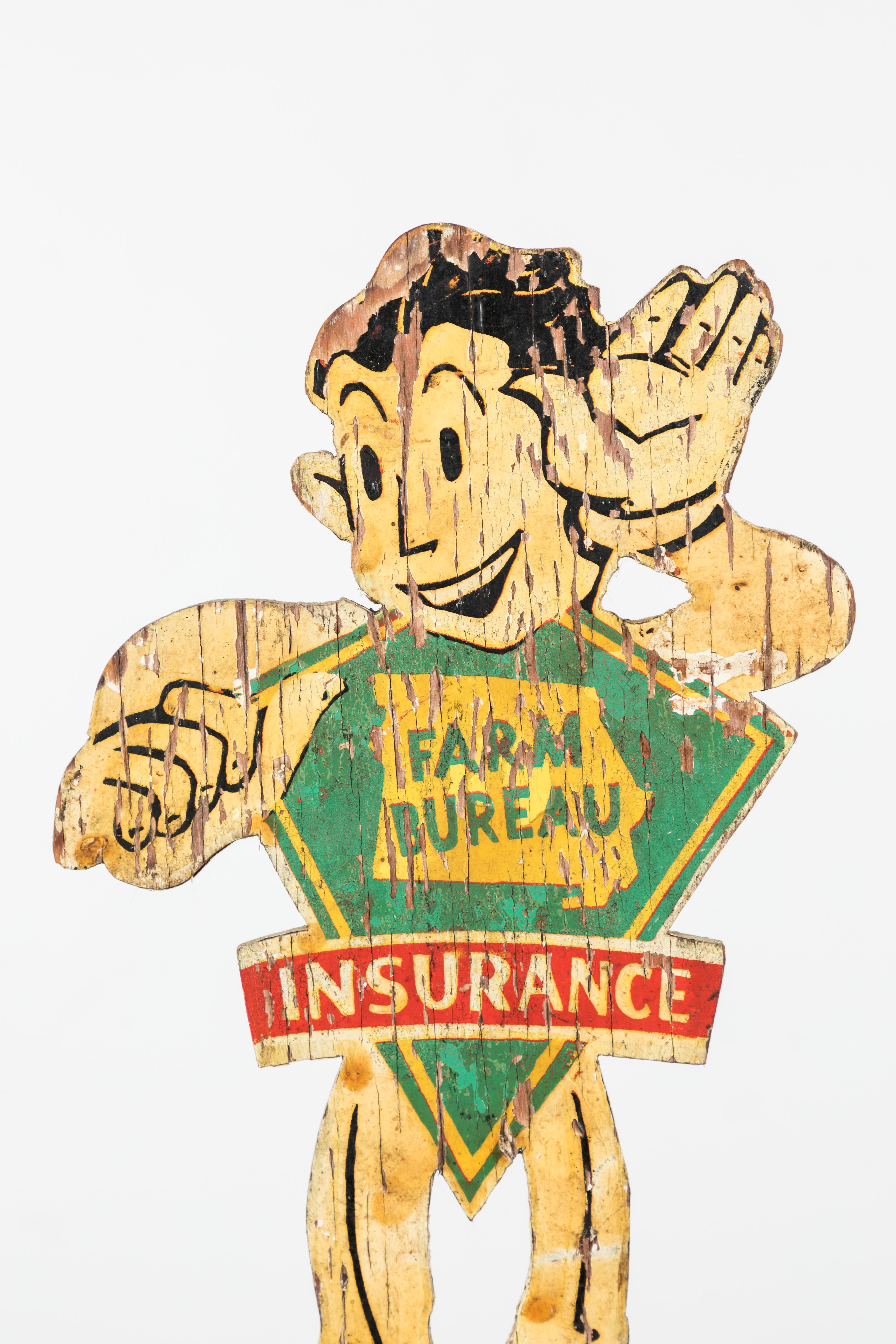 Great looking cartoon Midwestern Americana weathervane. Farm Bureau Insurance started in 1921. This great piece most likely was a premium or advertising piece. Hand painted wood with iron arrow. Presented on custom iron museum stand.