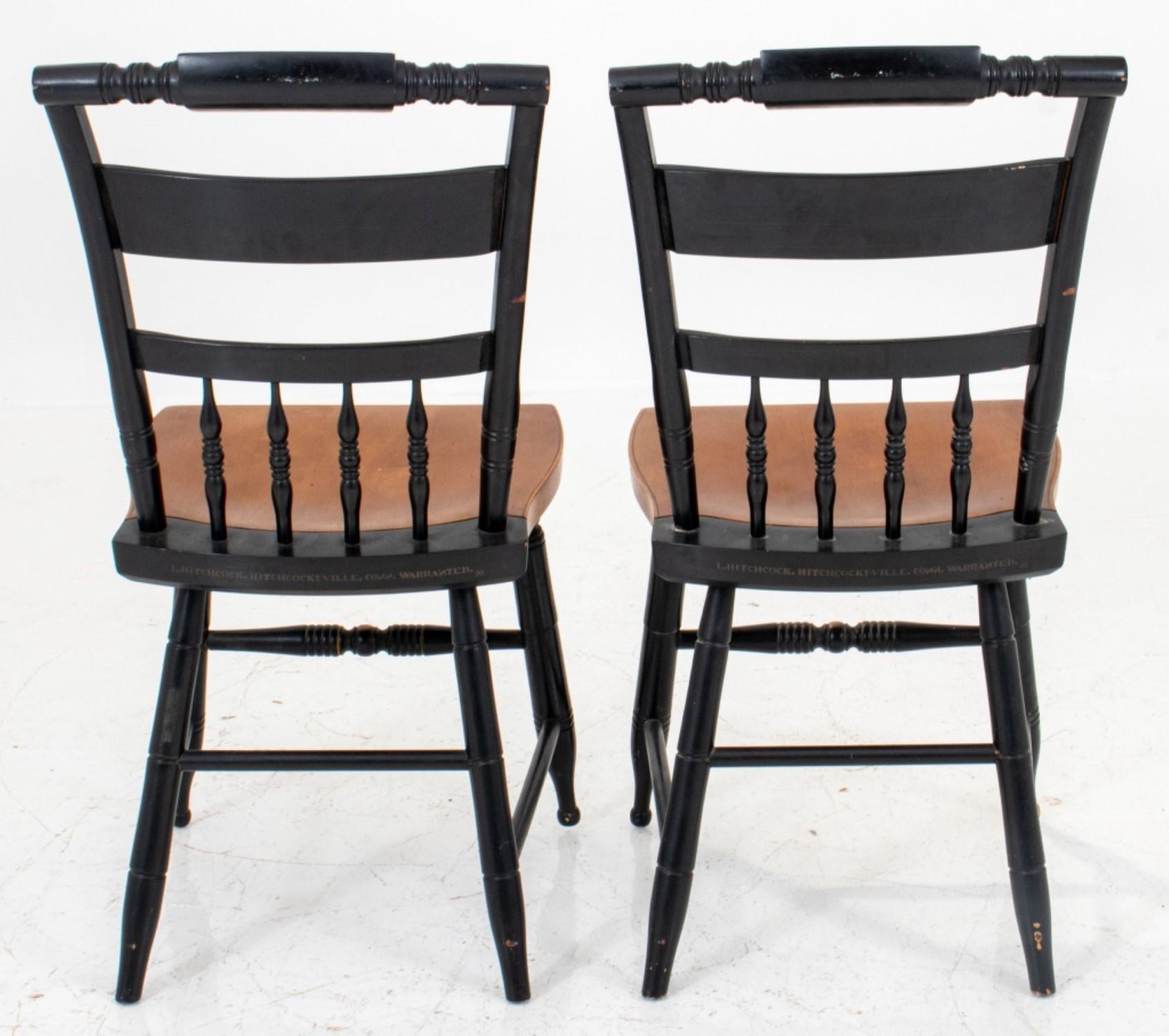 American Folk style gold-stenciled ebonized wood side chairs in the Hitchcock manner, with floral stenciled decoration.

33.5 inches in height, 16 inches in width, 15.5 inches in depth, with an 18-inch seat.