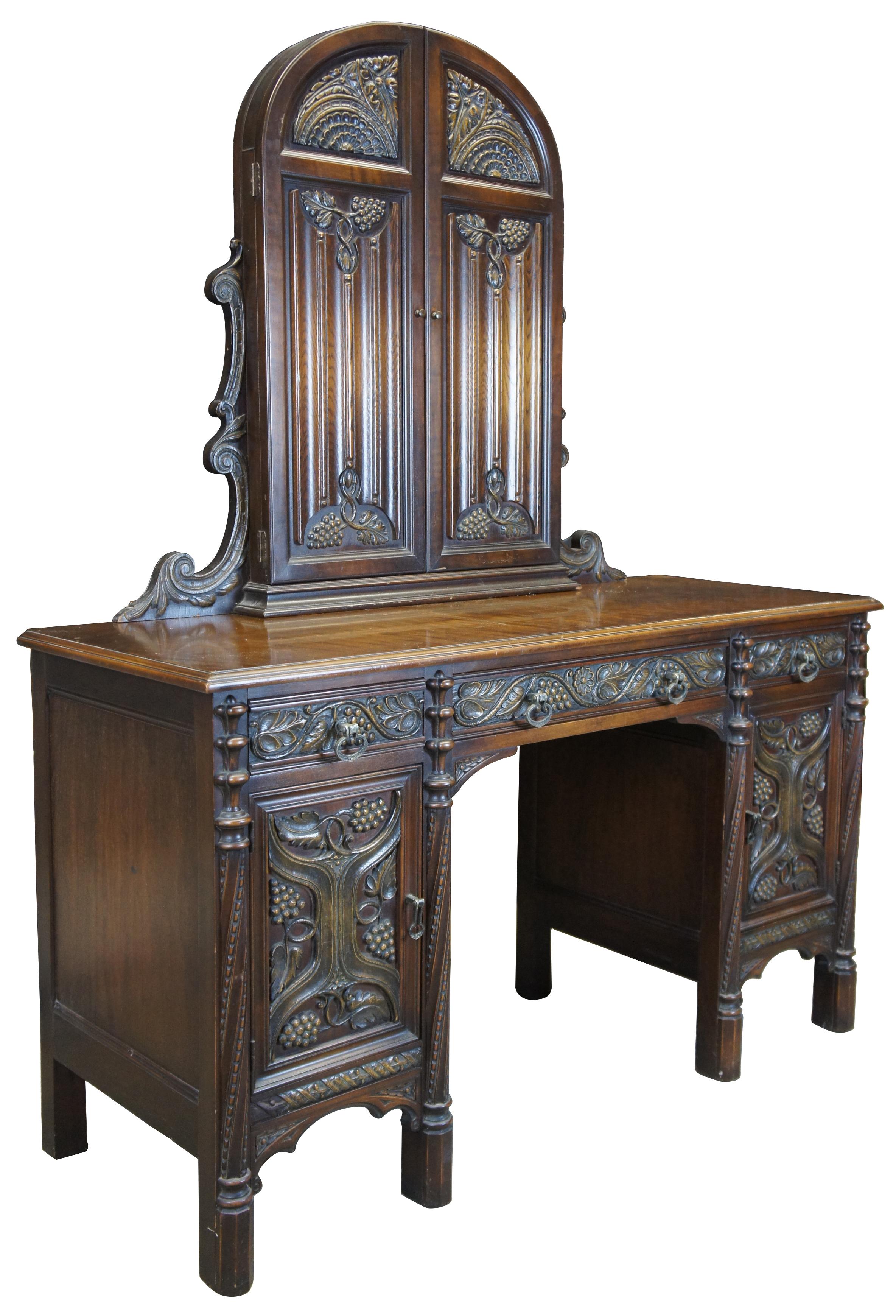 American Furniture Company Gothic or Spanish Renaissance Revival vanity desk and mirror. Operating out of Batesville Indiana since 1899, they worked closely and collaborated in part with Romweber. Specializing in high grade bedroom suites and