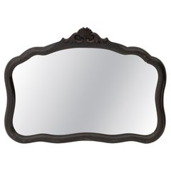 Miroir biseauté en bois ébonisé de l'époque dorée américaine
