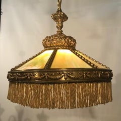 American Gilt Bronze and Slag Glass Hanging Fixture.