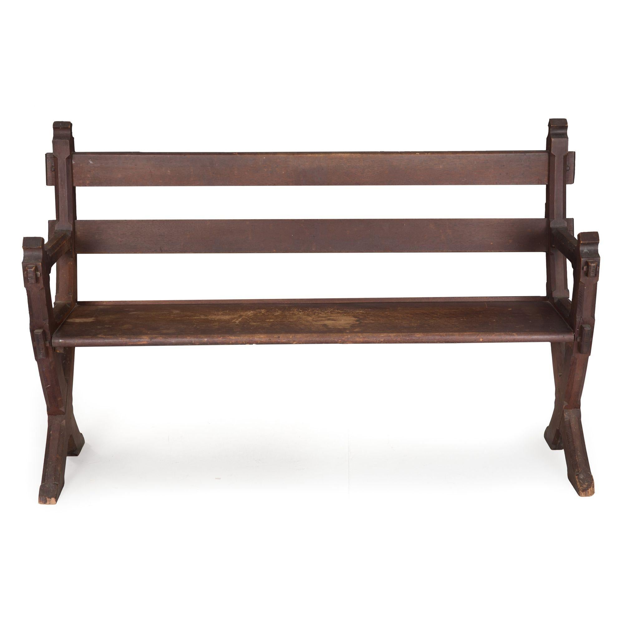 GOTHIC REVIVAL DOVETAILED WALNUT HALL BENCH
United States, circa 1890; with a wonderful early oxidized surface
Item # 209HOE29P 

A very interesting settee from the last decade of the nineteenth century, this wonderful example is executed in solid