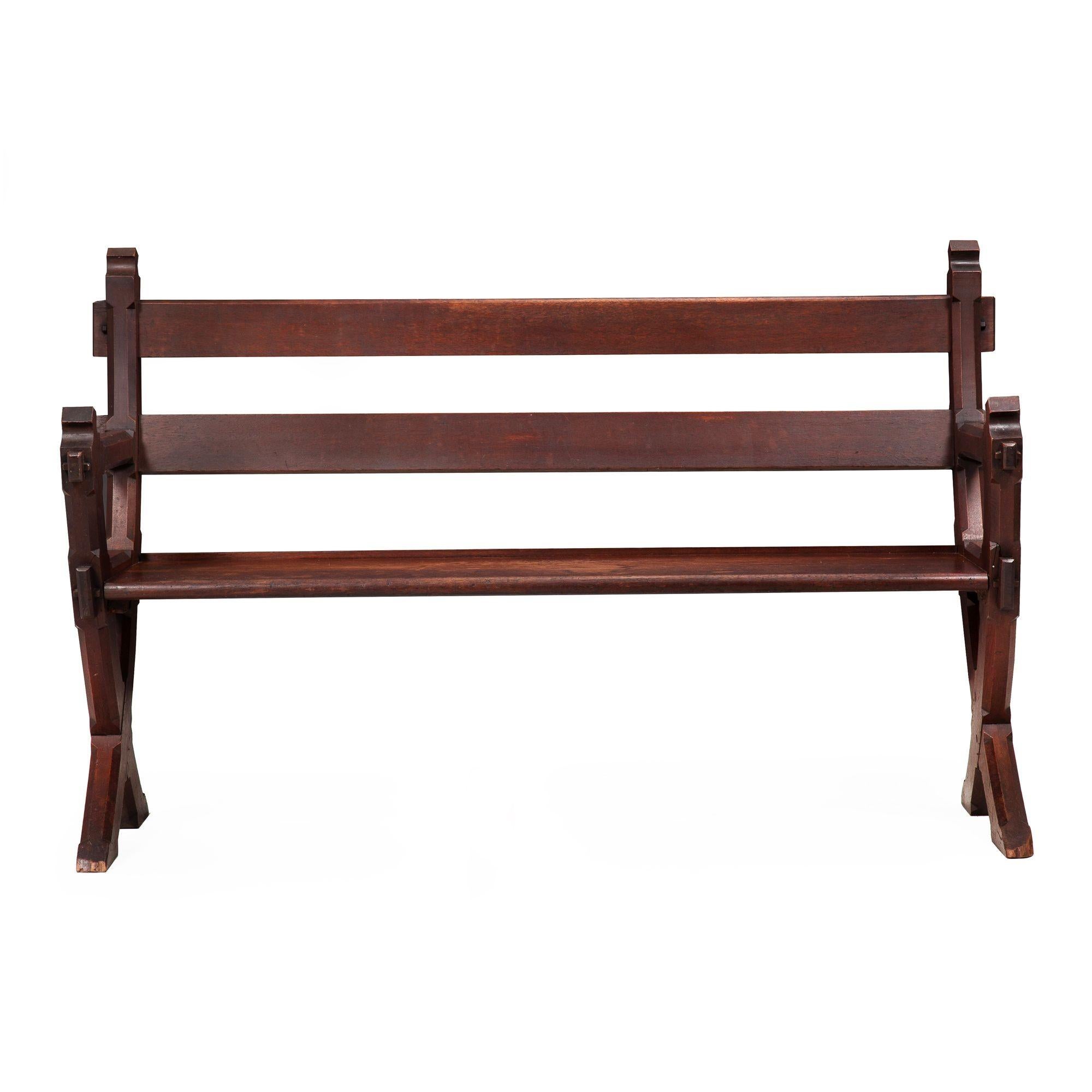 GOTHIC REVIVAL DOVETAILED WALNUT HALL BENCH
Probably the United States, circa last quarter of the 19th century
34 3/8