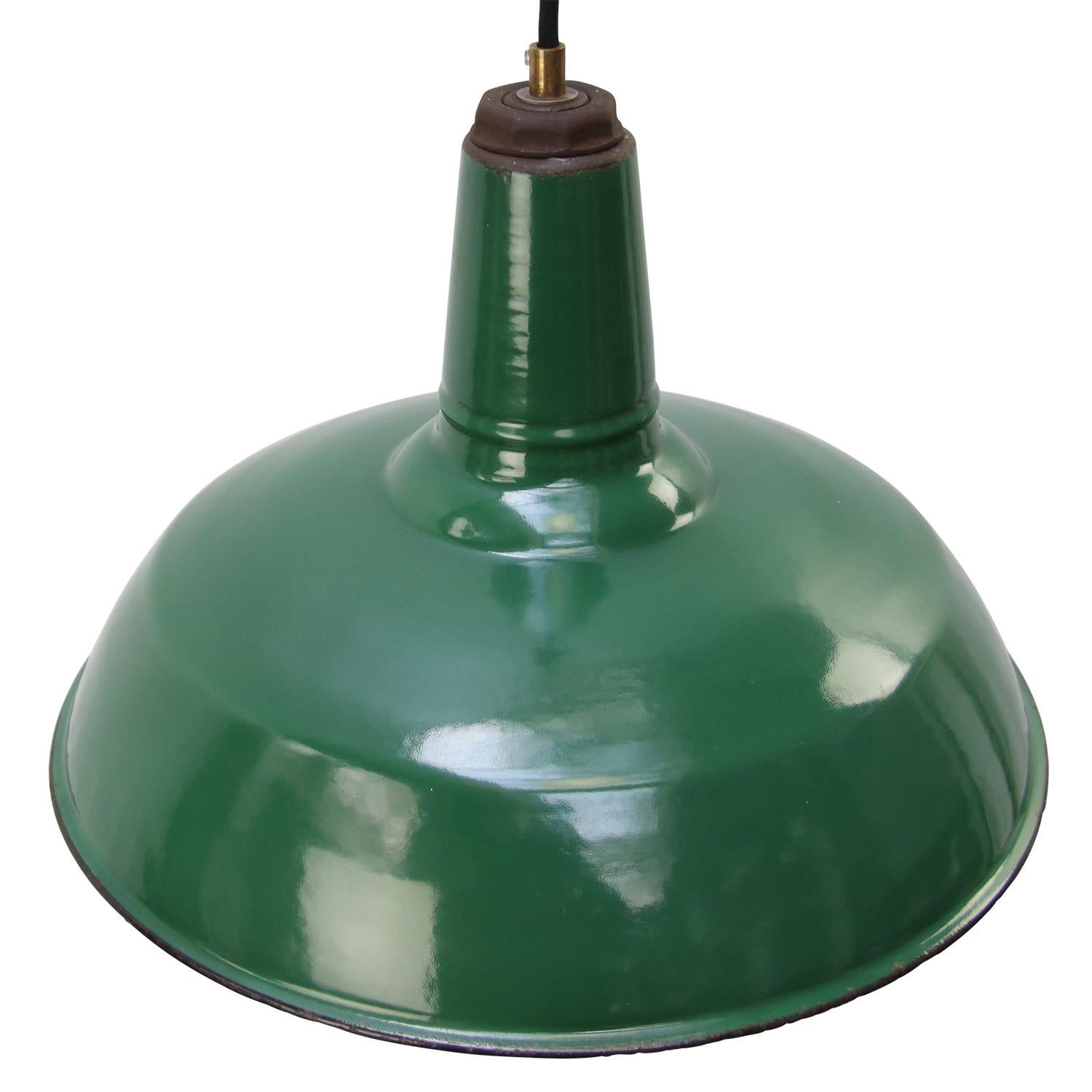 American industrial factory pendant light by Silvaking, USA
green enamel, white interior.
Rust metal top

Weight: 1.70 kg / 3.7 lb

Priced per individual item. All lamps have been made suitable by international standards for incandescent light