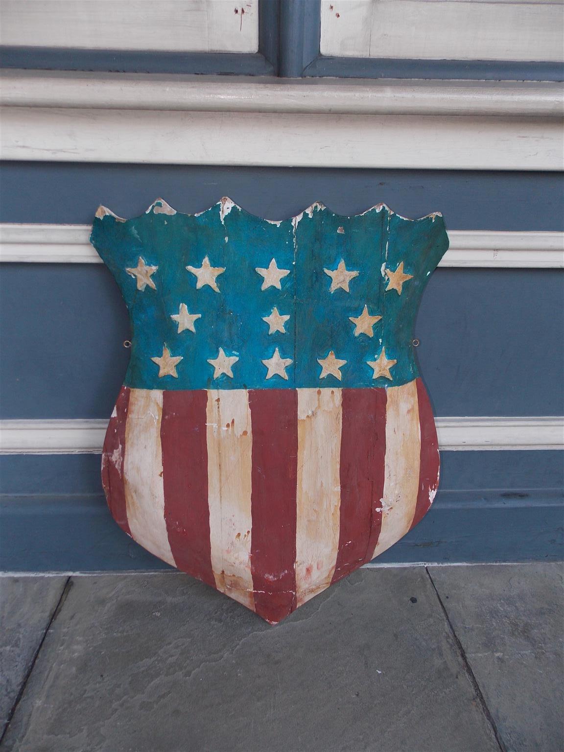 American Hand Carved and Painted Patriotic Shield with Raised Stars. C. 1870 In Excellent Condition In Charleston, SC