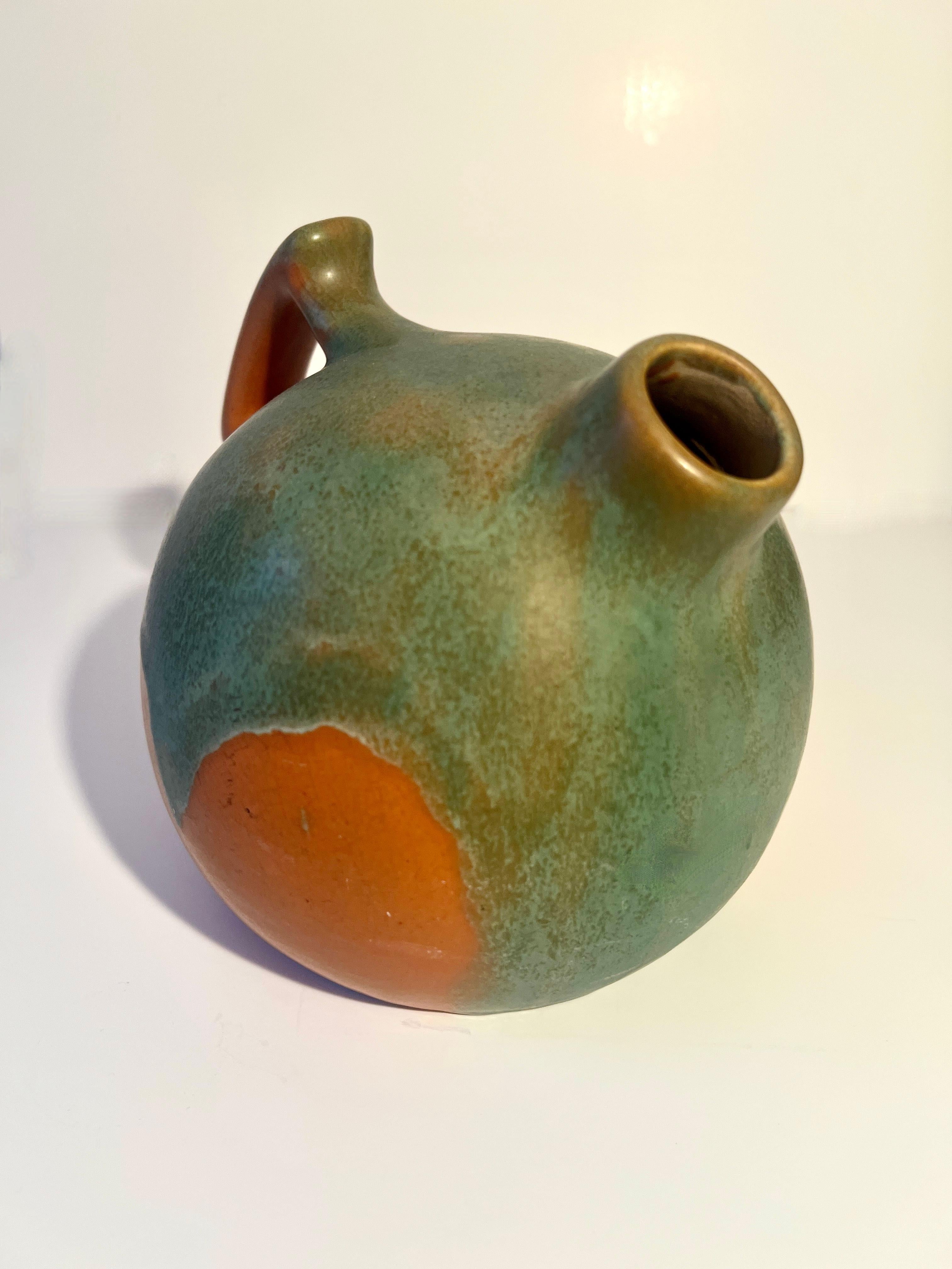 Jarra redonda de cerámica artesanal americana Al fuego en venta