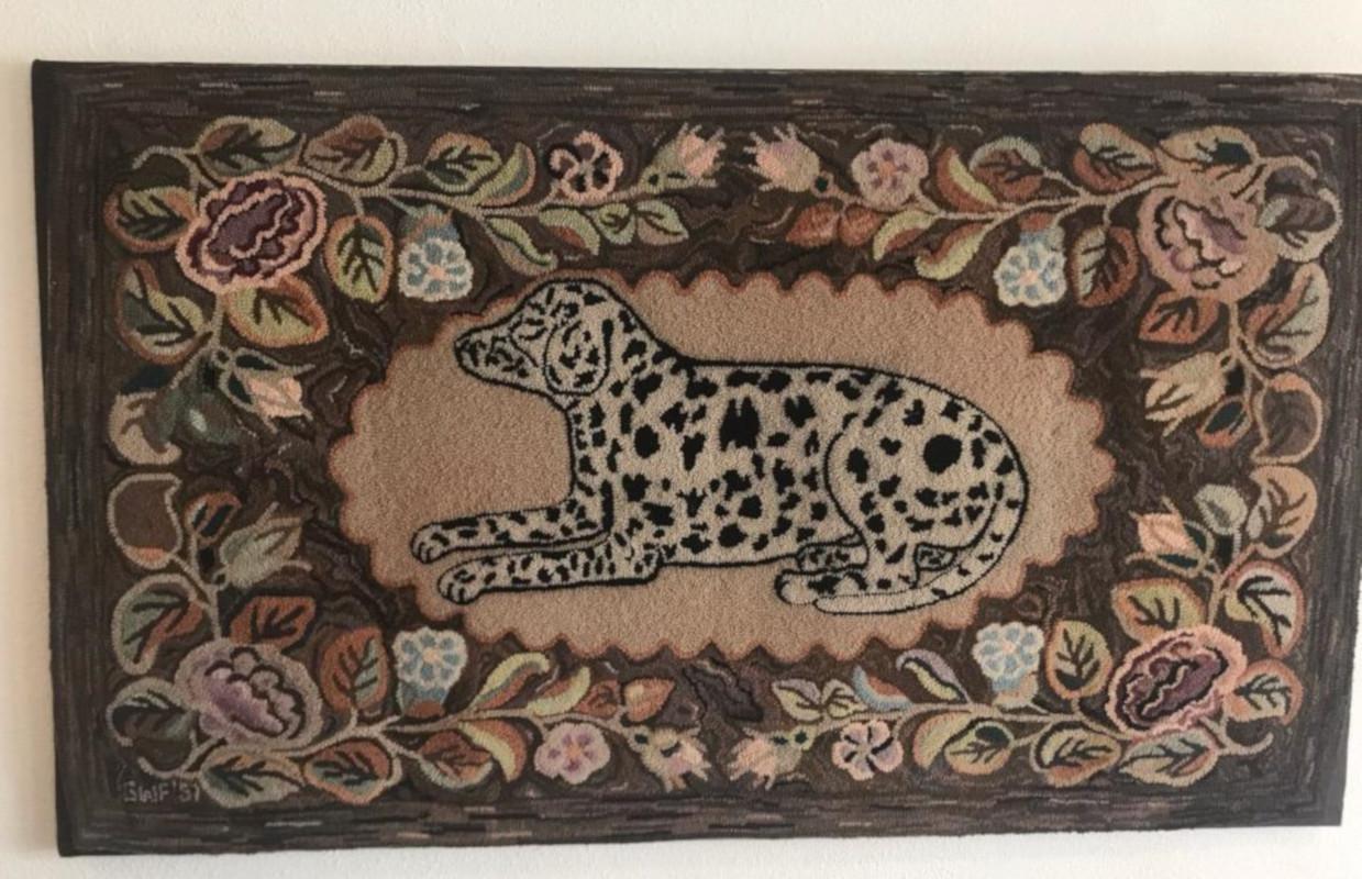 This amazing hand hooked rug from Lancaster County, Pennsylvania is in fine condition and is signed and dated. This dalmatian hand hooked rug is signed and dated 1951.