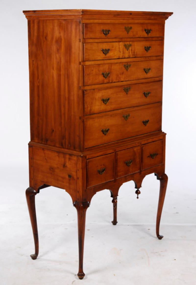 A very fine American Queen Anne maple highboy with five graduated drawers and three smaller drawers in base. Measures: 68