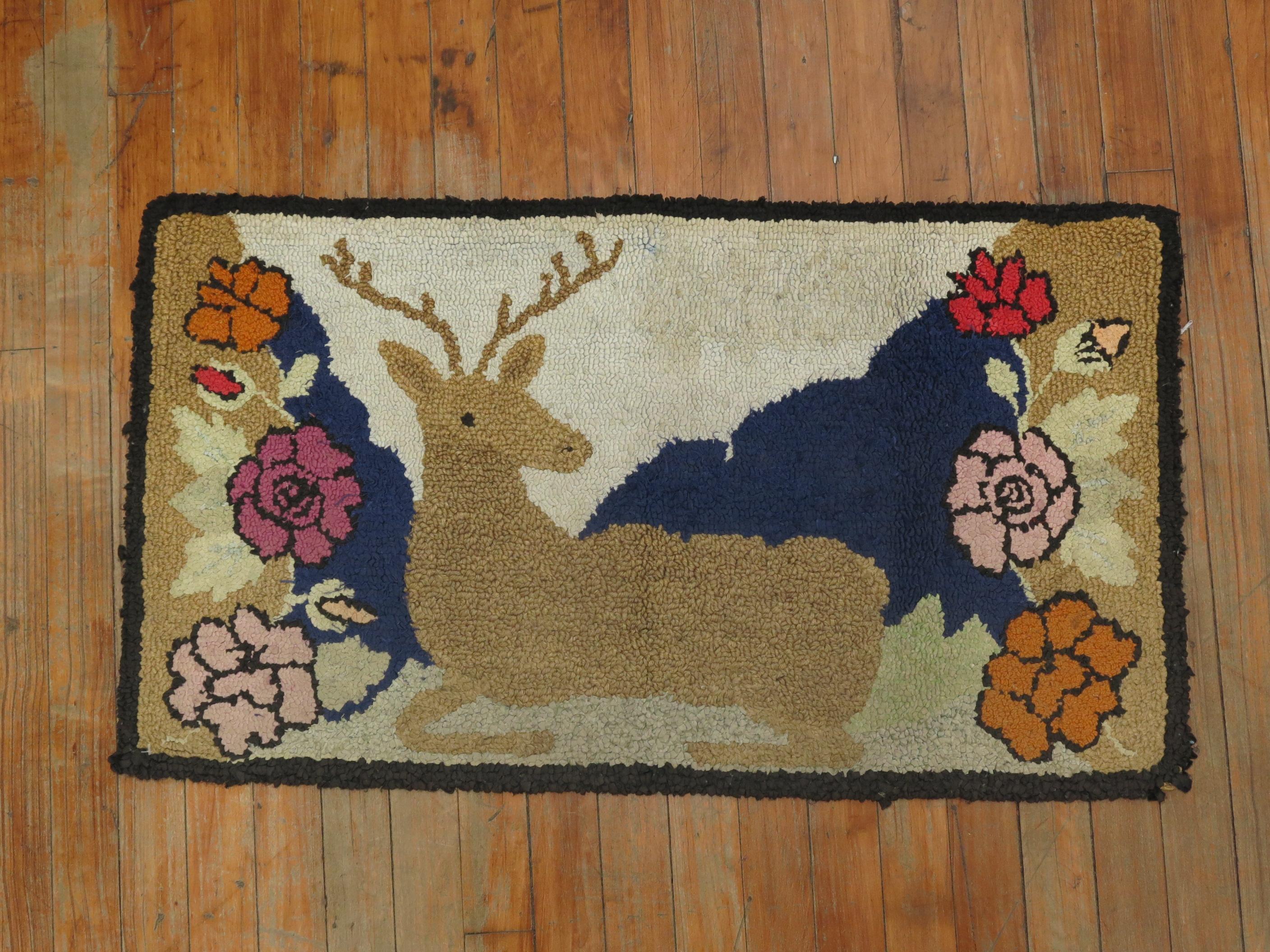 A handmade decorative American hooked rug from the middle of the 20th century depicting a deer. Condition is really nice. No stains, no tears, has been professionally cleaned.

1'8'' x 3'11''
