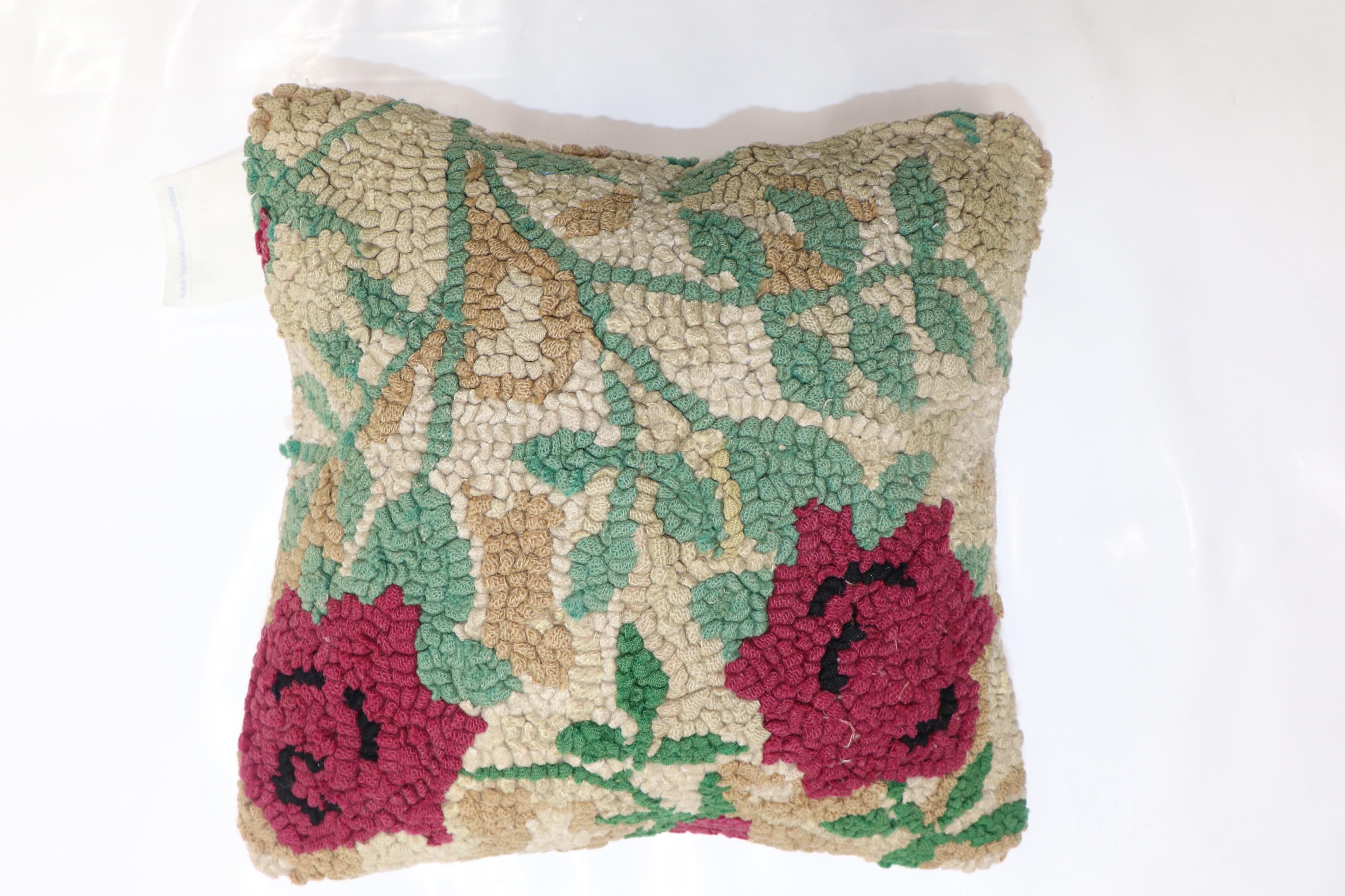 Pillow made from a colorful 20th-century floral American hooked rug

Measures: 11