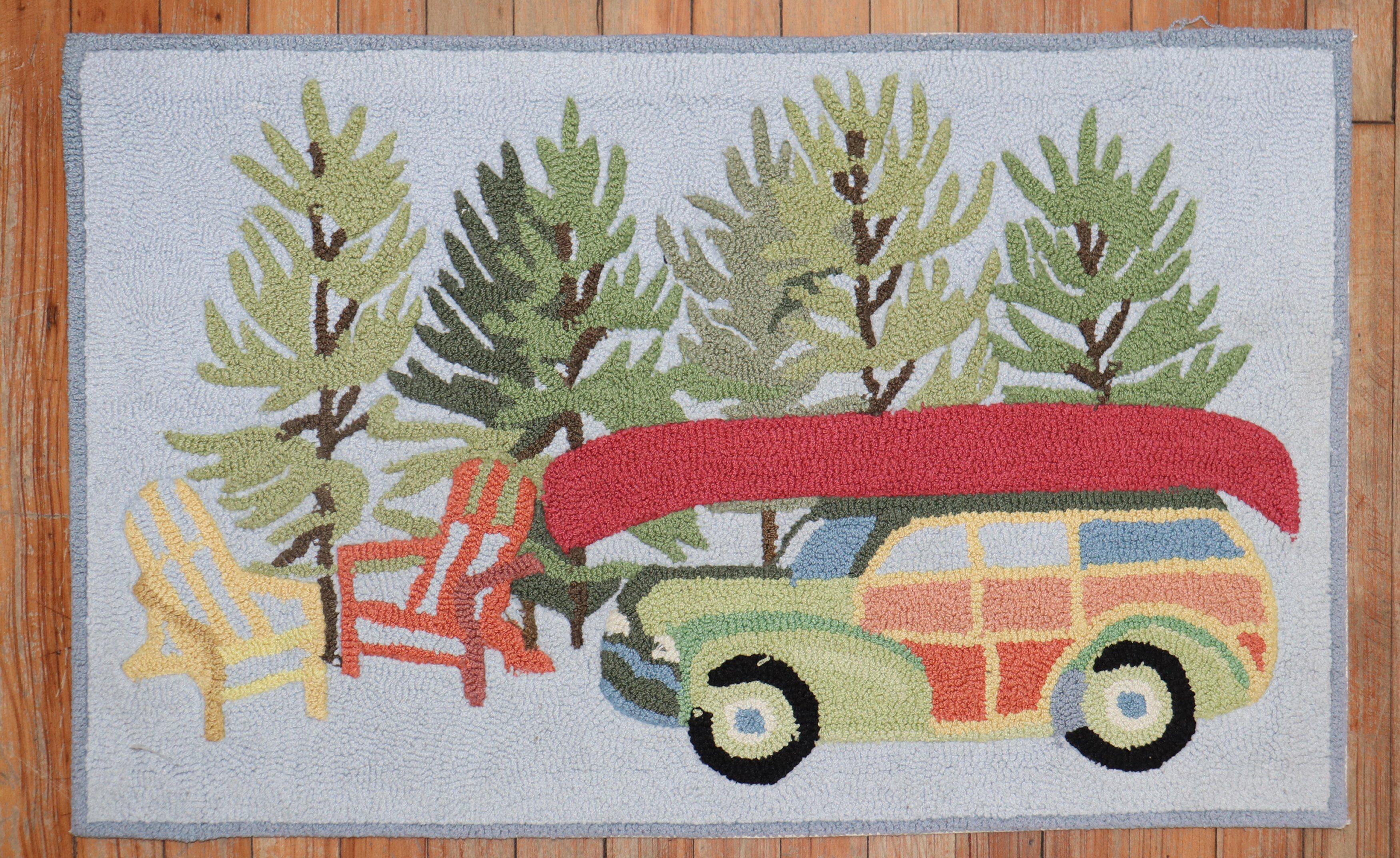 Late 20th century colorful hand-loomed American hooked rug with a red canoe on top of a small car surrounded by a few trees and 2 chairs

Measures: 1'10'' x 2'9''.