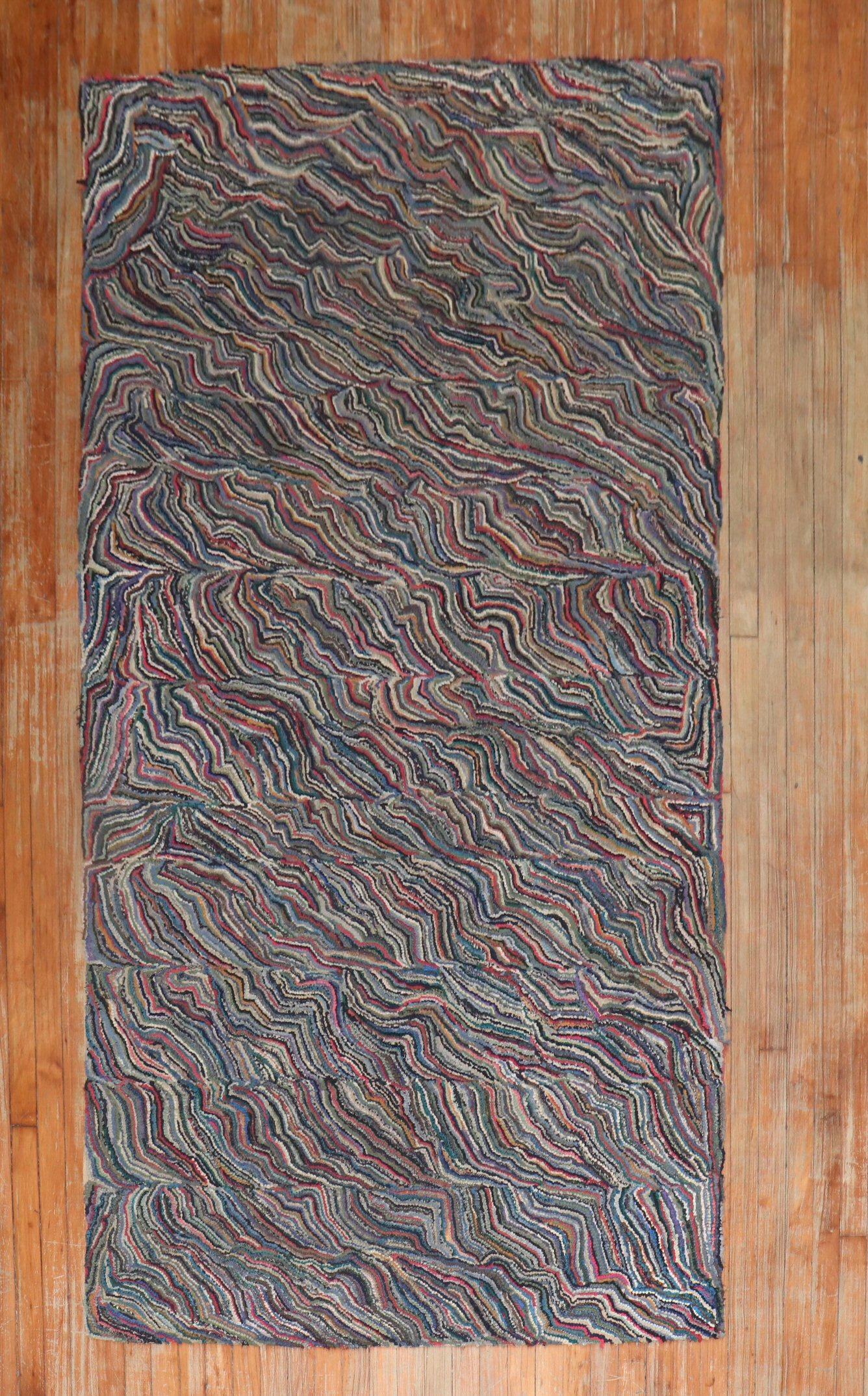A handmade one-of-a-kind American Hooked rug from the 3rd quarter of the 20th century w

Measures: 4'4'' x 8'6''.