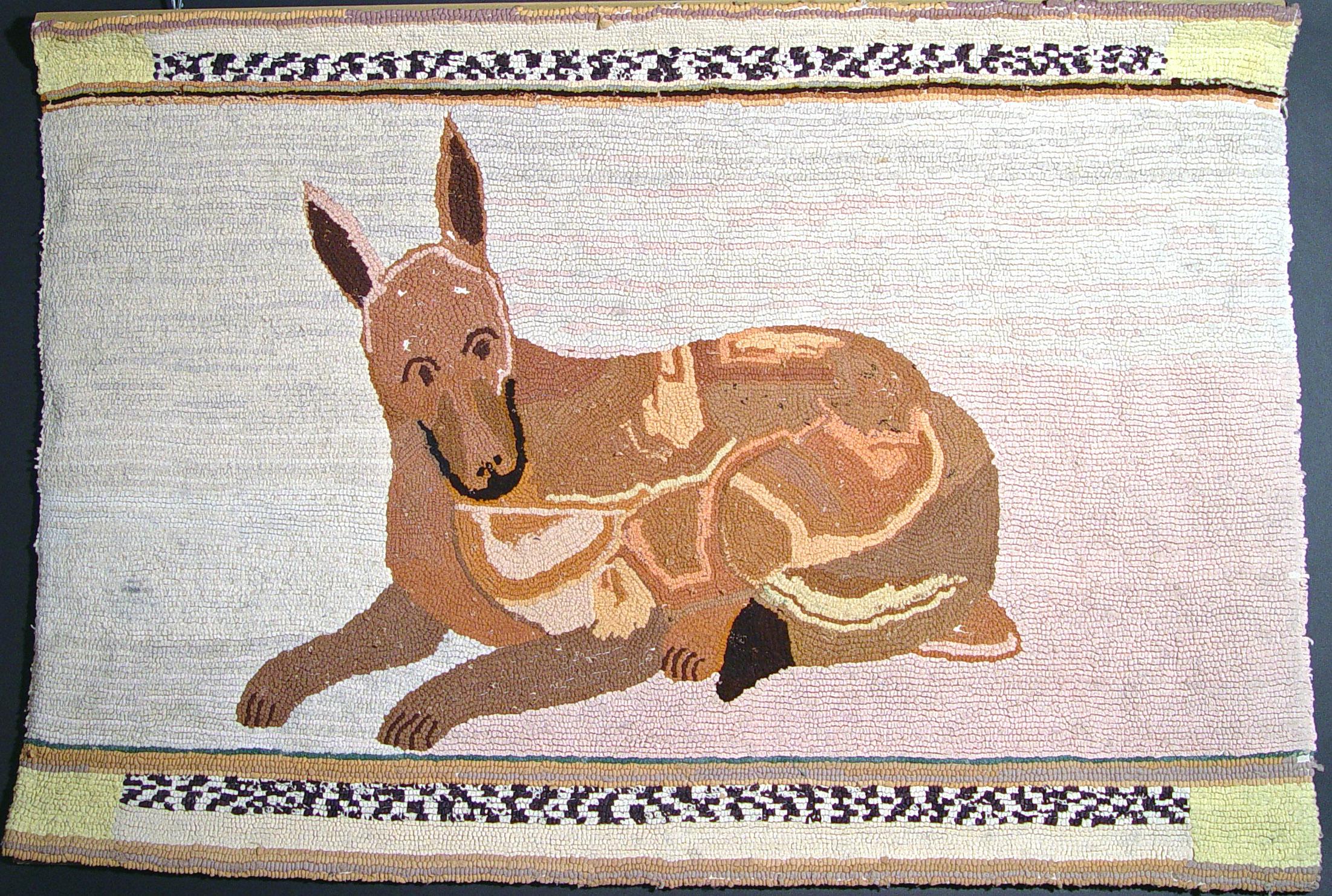 American Hooked Rug is possibly Vermont, 
circa 1890-1920

The charming and whimsical hooked rug is decorated with a large whimsical dog and is now mounted at the top rear to hang.

  