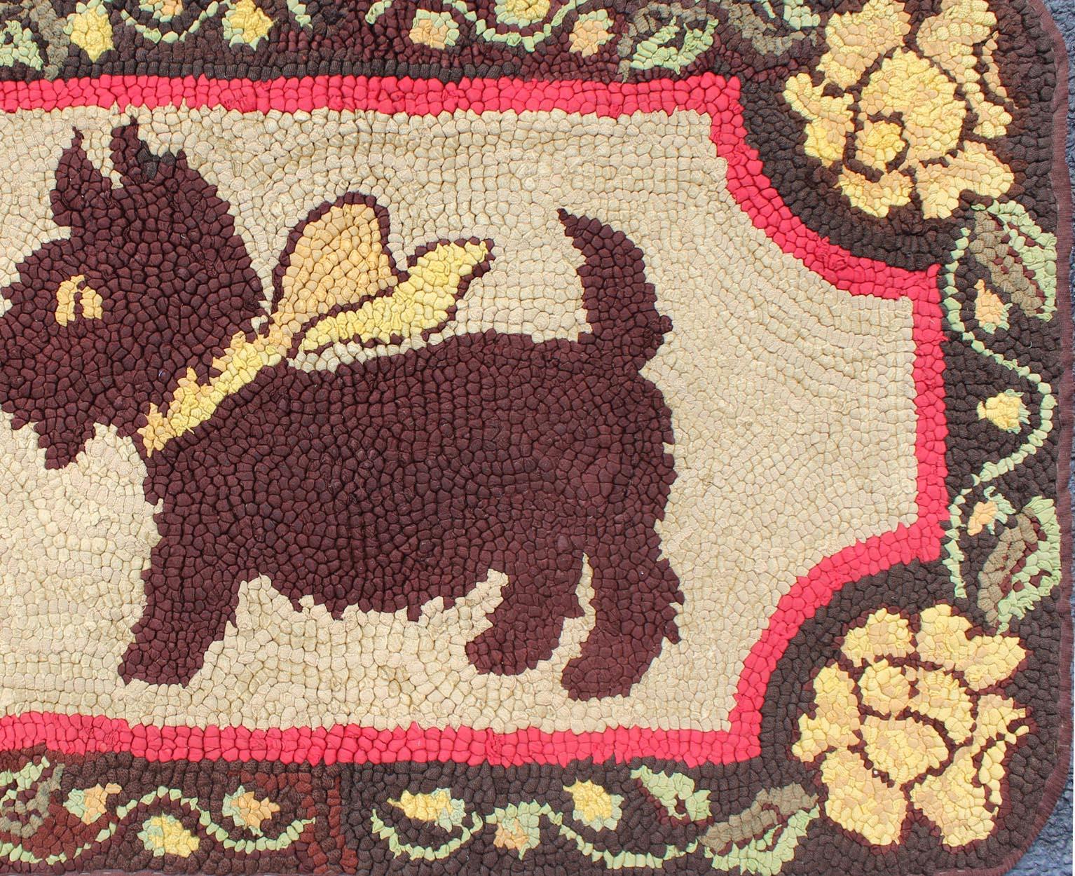 American Hooked rug featuring a scottie dog, rug S12-0405, country of origin / type: United States / Hooked, circa 1920

The Hooked Rug depicts the Scottie dog with a bow around it with small flowers surrounding it. 

Measures: 1'10 x 3.