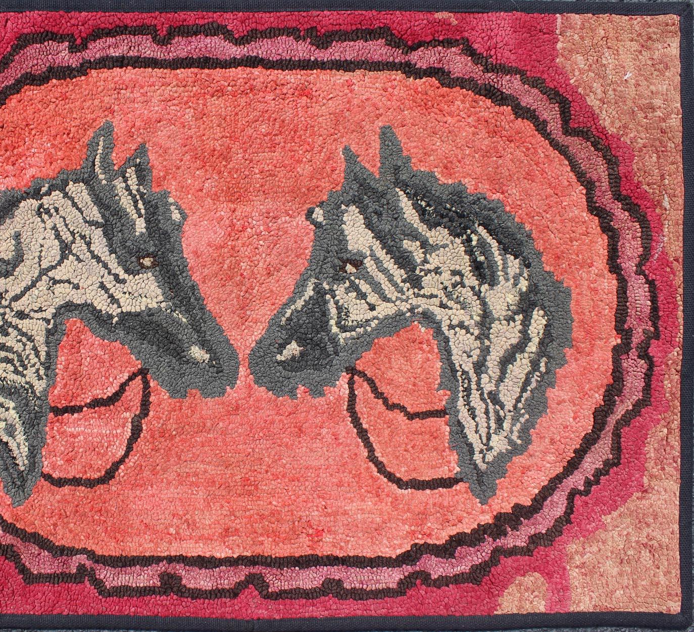American hooked rug featuring with Double Horse Heads  , rug S12-0406, country of origin / type: United States / Hooked, circa 1900

Measures:  2'1