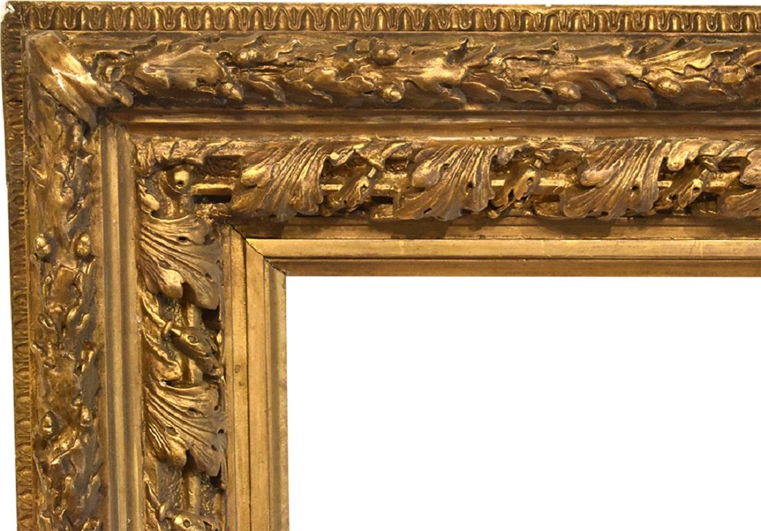 Hudson River Gold Leaf Frame, Cove Vergoldeter Bilderrahmen für Leinwandbilder, um 1875. Amerikanisch. Eichel und Blatt schwer Guss Gesso Ornament.

Falz Abmessungen: 17