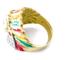 American Indian. 18k, 0.85 carat Diamond & Ruby Ring