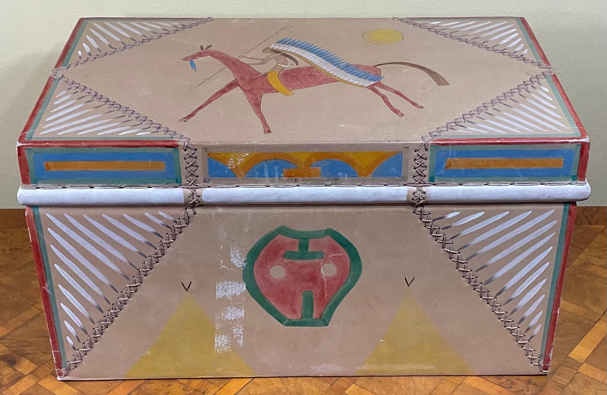 Beautiful box made by native American Indian, hand painted on leather of warrior riding on horse, and horses in nature.