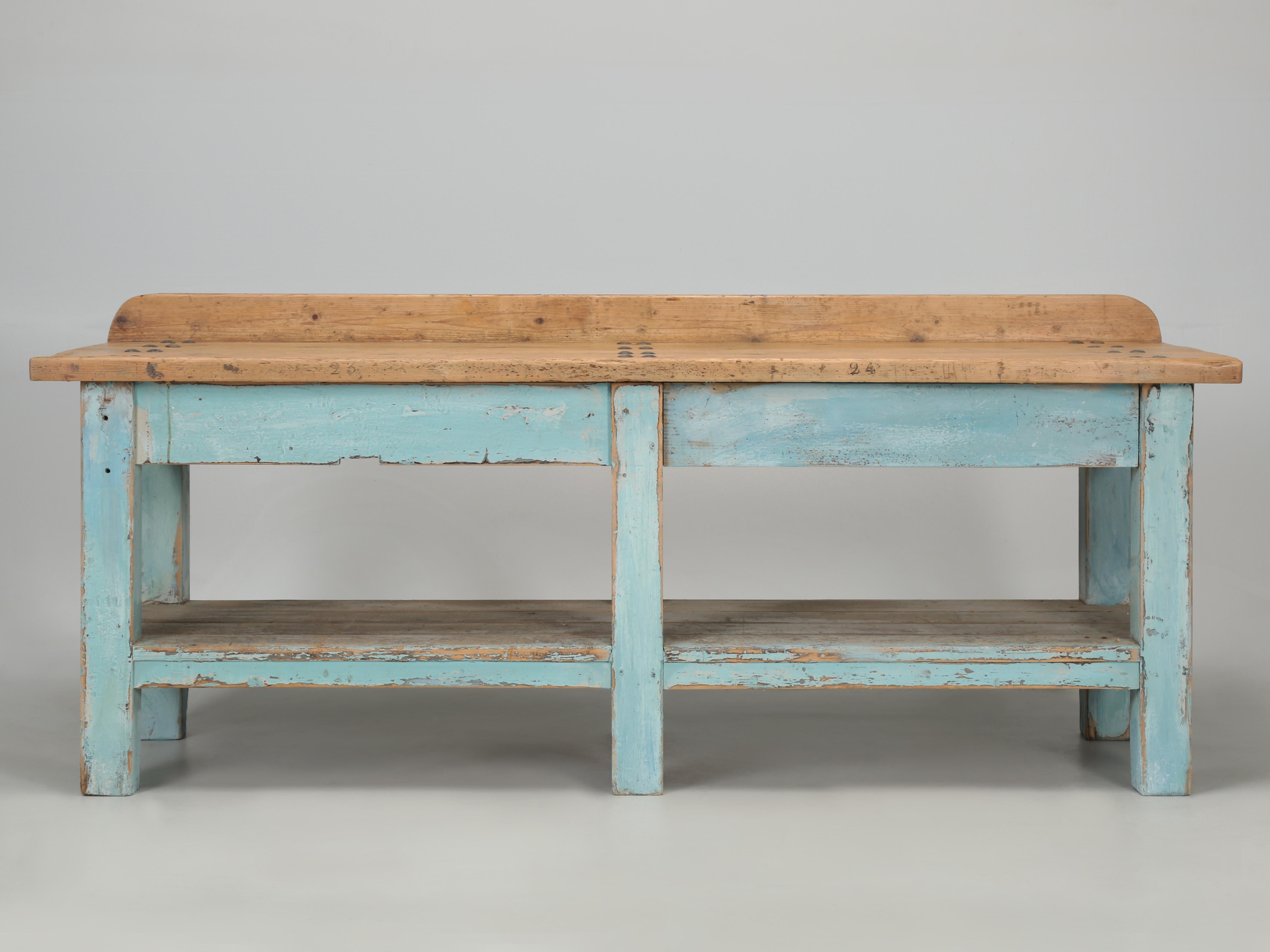 Antique Industrial work table, which could easily be repurposed for the center island in a country inspired kitchen. Our inhouse Old Plank restoration facility went through the work table to enhance the structural stability and did a thorough